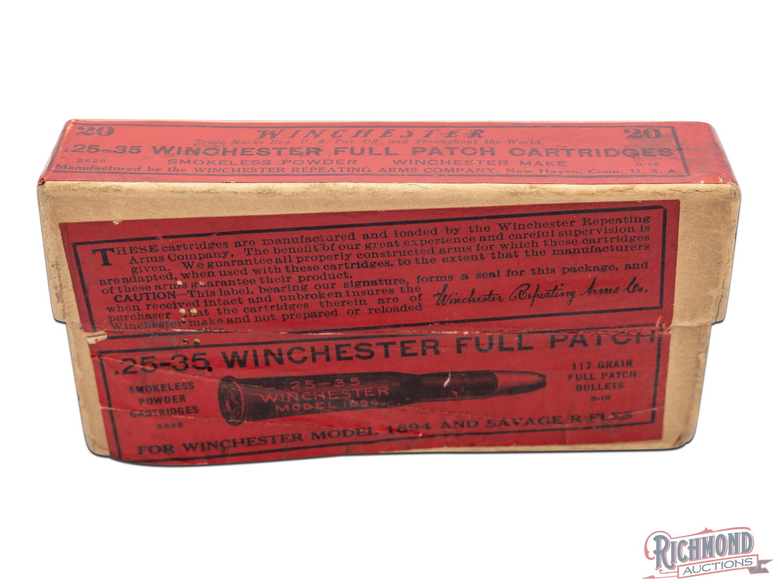 Full Box Of .25-35 Winchester Full Patch Cartridges With Uncut Label: These cartridges were made by Winchester Repeating Arms Co. and contains 20 .25-35 WCF cartridges. This two piece box has a red label on the top, front, and sides. The front label is not attached to t