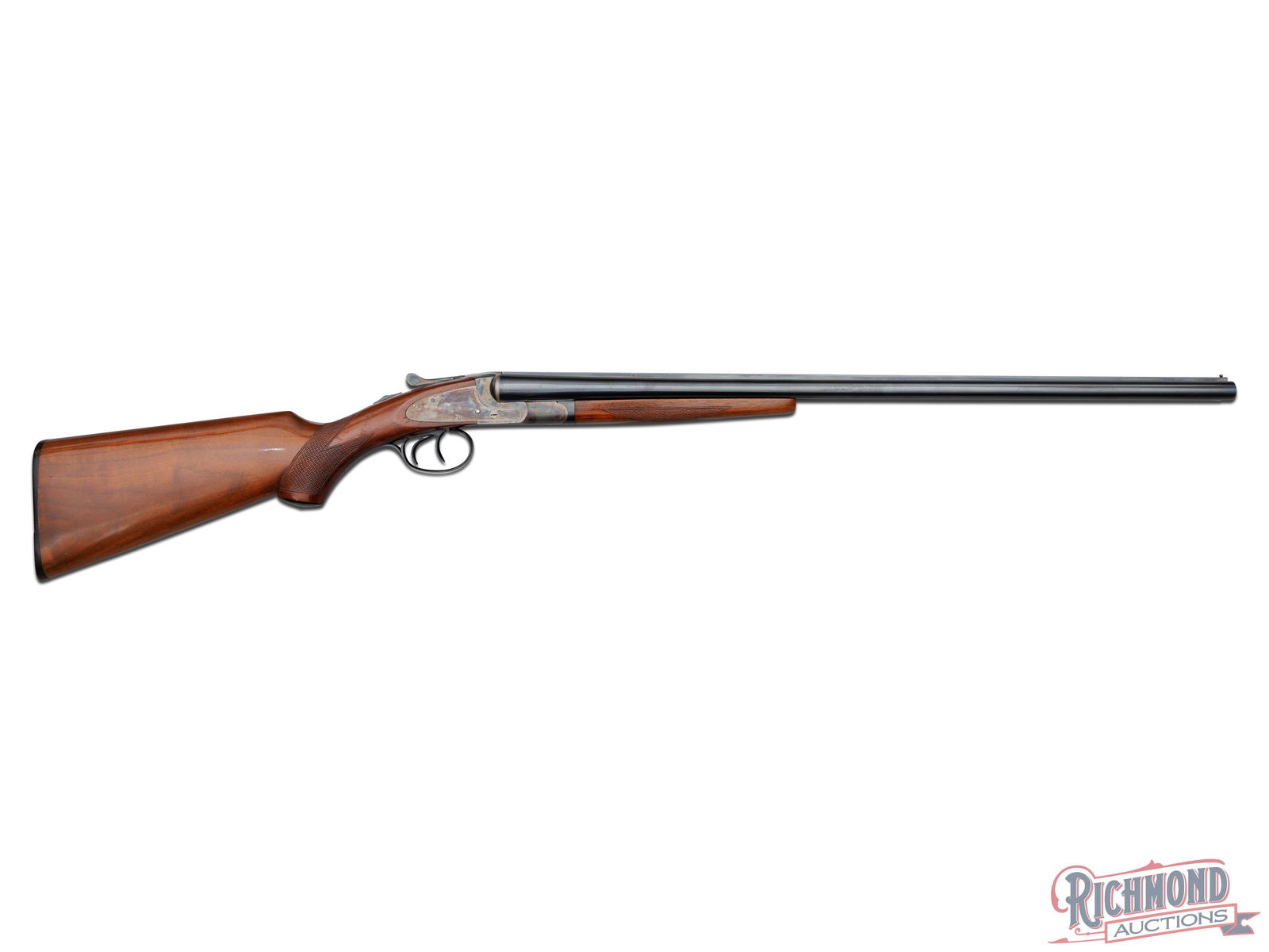 High Condition L.C. Smith Field Grade Side by Side Shotgun in 20 Gauge: Made by Hunter Arms of Fulton, New York in 1920. Blued 26" Armor Steel barrels Hunter Arms Address and "FIELD GRADE" markings. Barrels have extractors, high rib sight plain, bead sight with 2-3/4" cha