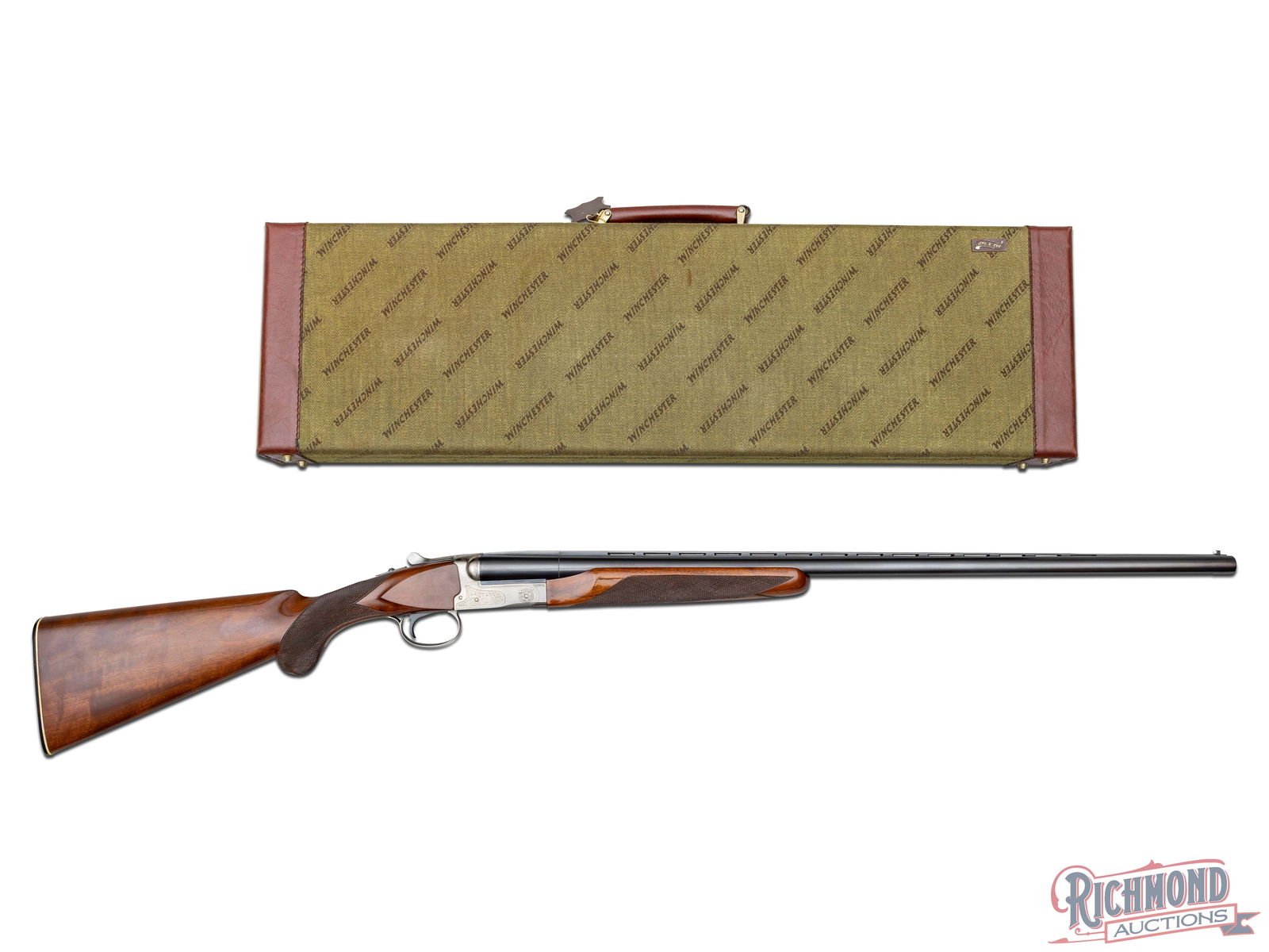 Winchester Model 23 XTR Pigeon Grade SxS 20 Gauge Shotgun in Original Factory Case: Made in Japan by Winchester from 1978 to 1986. Blued 28" side by side Winchester Proof Steel barrels with two line Winchester Model/ Address with Winchester Proofmark and Winchester "PIGEON GRADE" mar