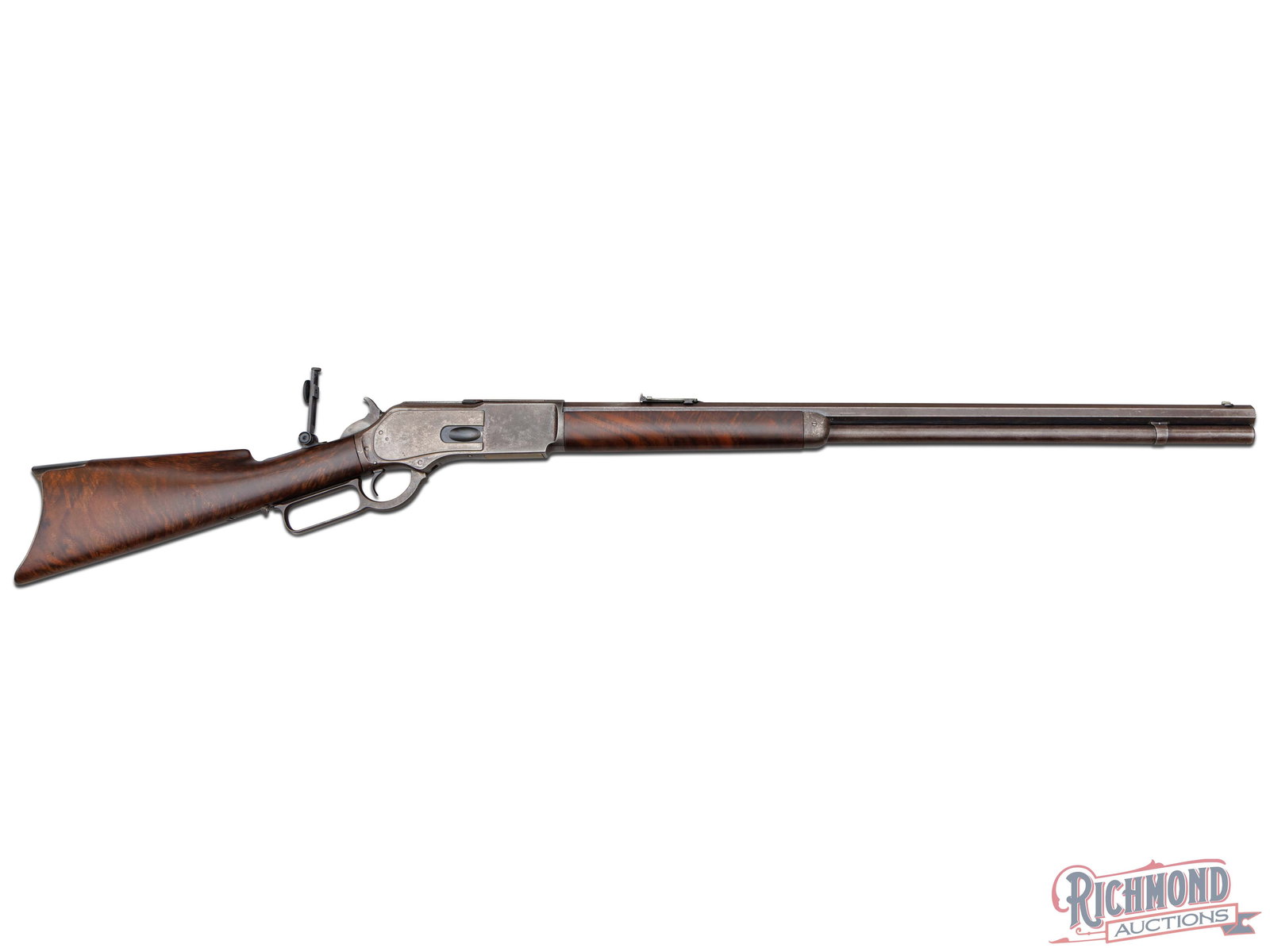 Special Order Case Hardened Frame Winchester Model 1876 Lever Action Rifle in 45-75 Caliber: Made in 1883 by Winchester Repeating Arms Company. Blued 28" octagon rifled barrel with King's Improvement two line Winchester Address in .45-75 W.C.F. caliber. Blued full tubular magazine. Standard 1