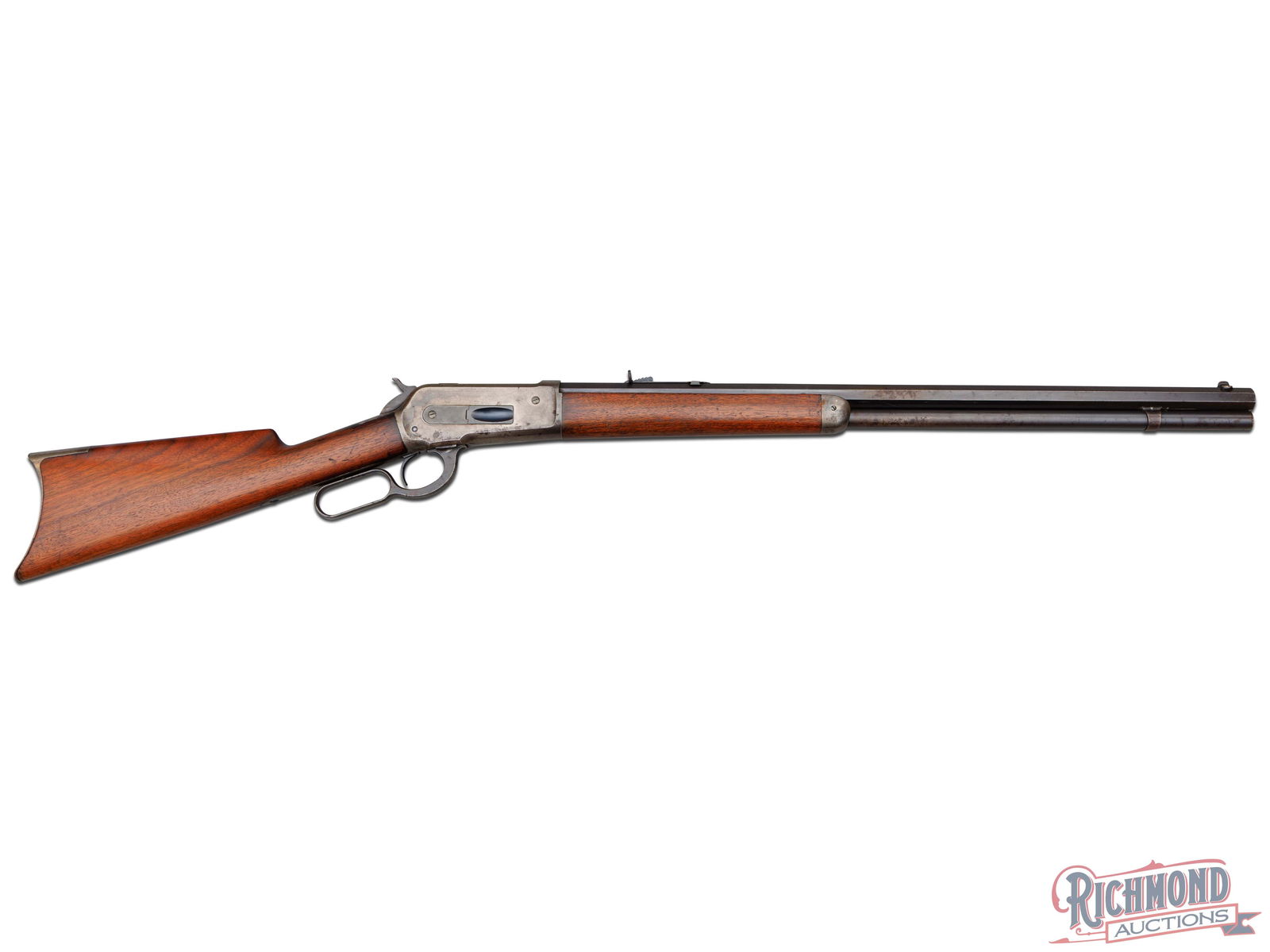 Collector Condition Antique Winchester Model 1886 Lever Action Rifle in 45-90 W.C.F. Caliber: Made in 1894 by Winchester Repeating Arms Company. Blued 26" octagon rifled barrel with two line Winchester Address with 45-90 W.C.F. caliber marking at breech. Blued full tubular magazine. Winchester