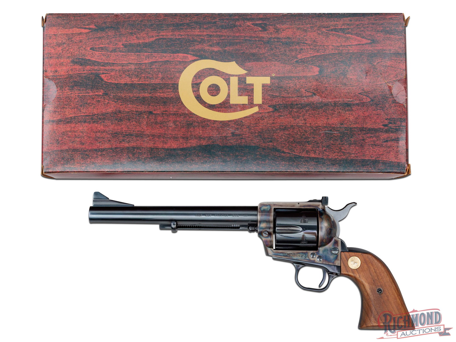 Collector Quality 1979 Colt New Frontier Single Action Army .45 Colt Revolver in Factory Box: Manufactured by Colt PTFA Mfg Co in 1979. This 3rd generation SAA is like new. Features a 7-1/2" blued barrel with rear adjustable square notch sight ramped front blade. Single line Colt address on to