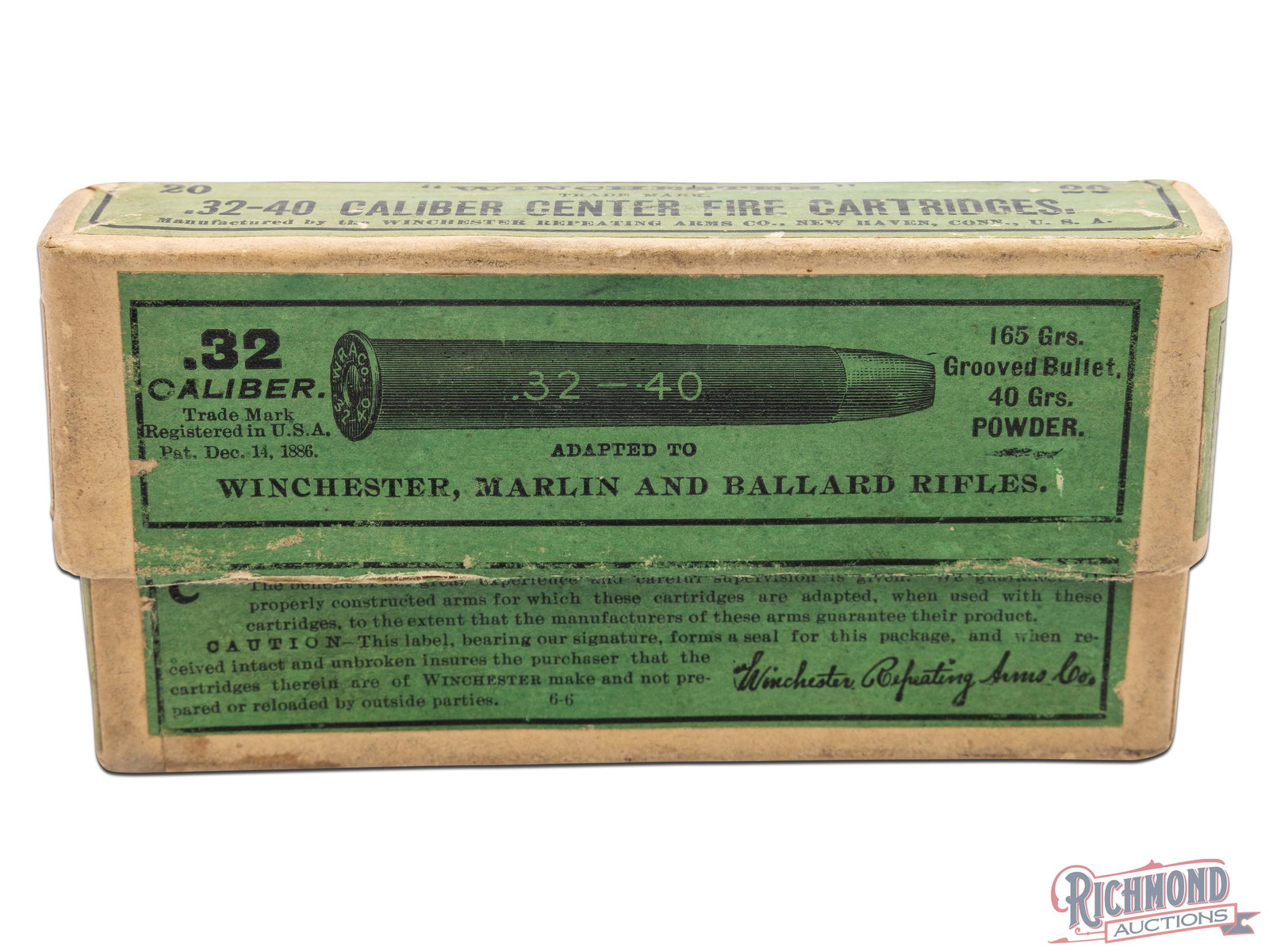 Full Box Of Winchester .32-40 Centerfire Cartridges: This full two piece box contains twenty .32-40 centerfire cartridges made by Winchester Repeating Arms Co. The box has rounded sides and green labels on the top, front, and sides and the red "W" trade