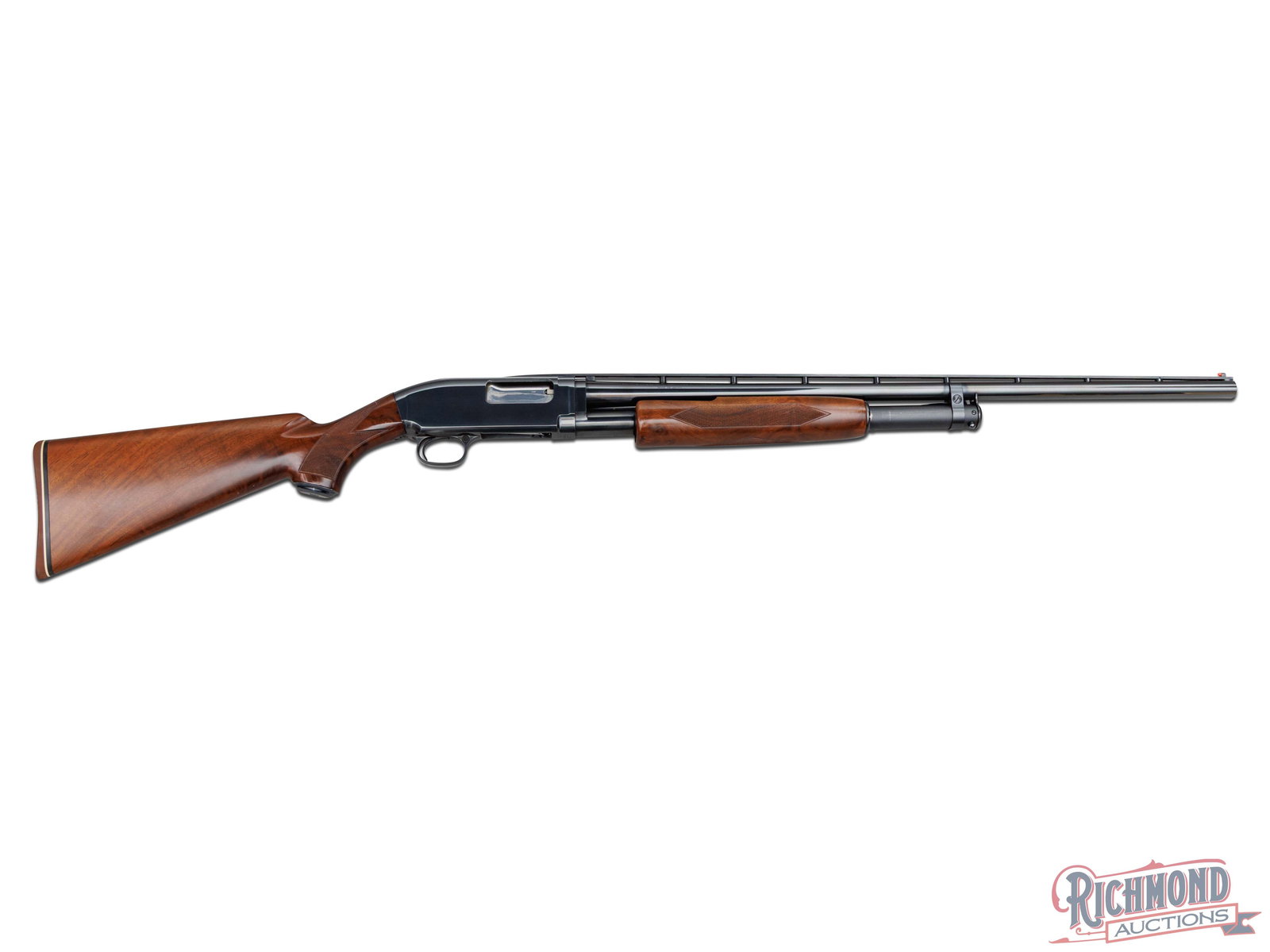 Browning Model 12 Pump / Slide Action 28 Gauge Shotgun: Manufactured by Browning in 1990. Features a 26" blued ventilated rib barrel with white mid-bead and red front bead sight. Chambered for 2-3/4" shells with Modified choke. Three-quarter barrel length
