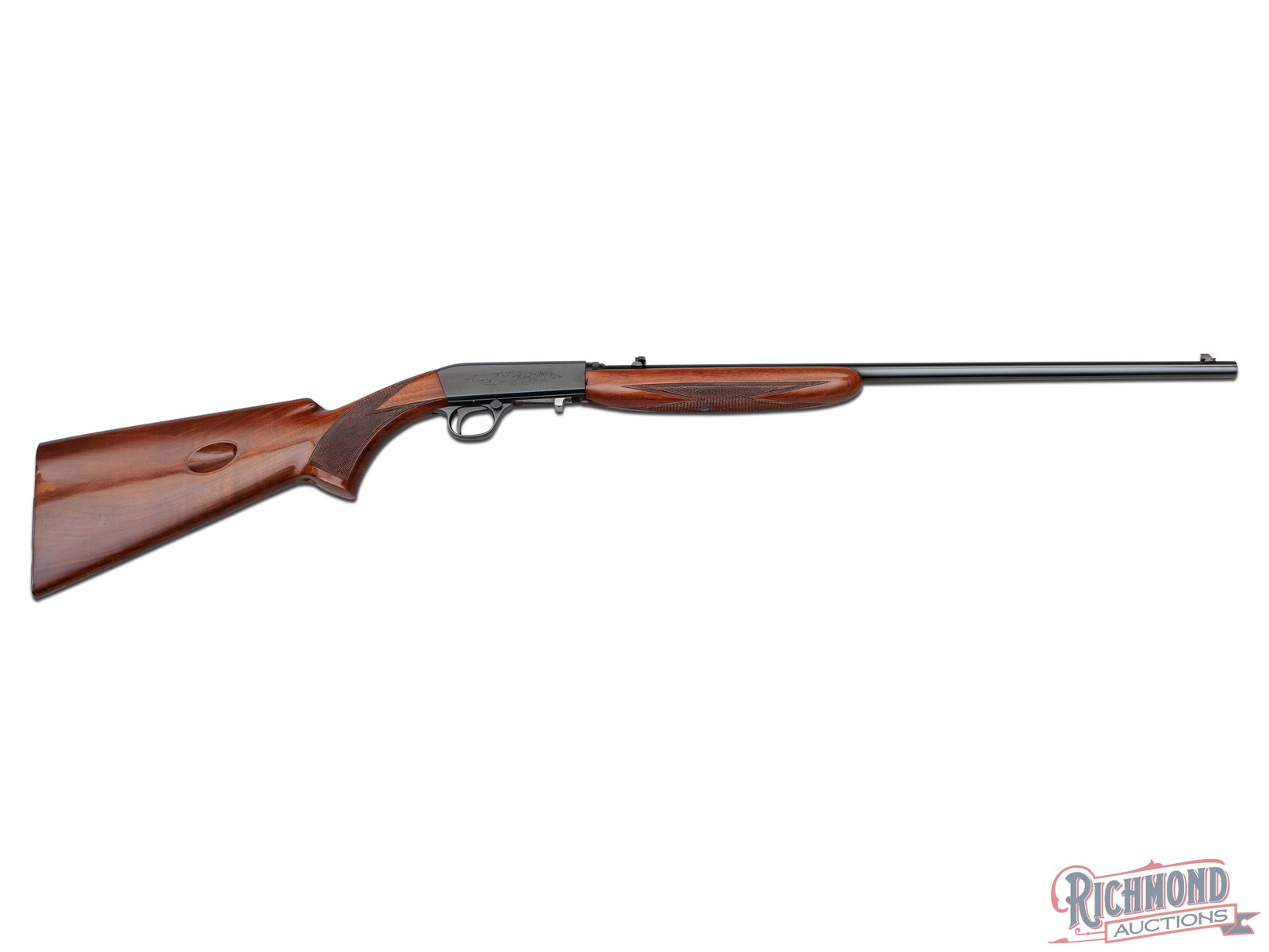 1961 Belgium Browning SA-22 Takedown Semi-Auto Rifle in Rare .22 Short: Manufactured in Belgium for Browning in 1961. This early rifle features a rare factory 22" blued round barrel with rear flip-up notch and blade front sight. Semi-automatic action with cross bolt safet