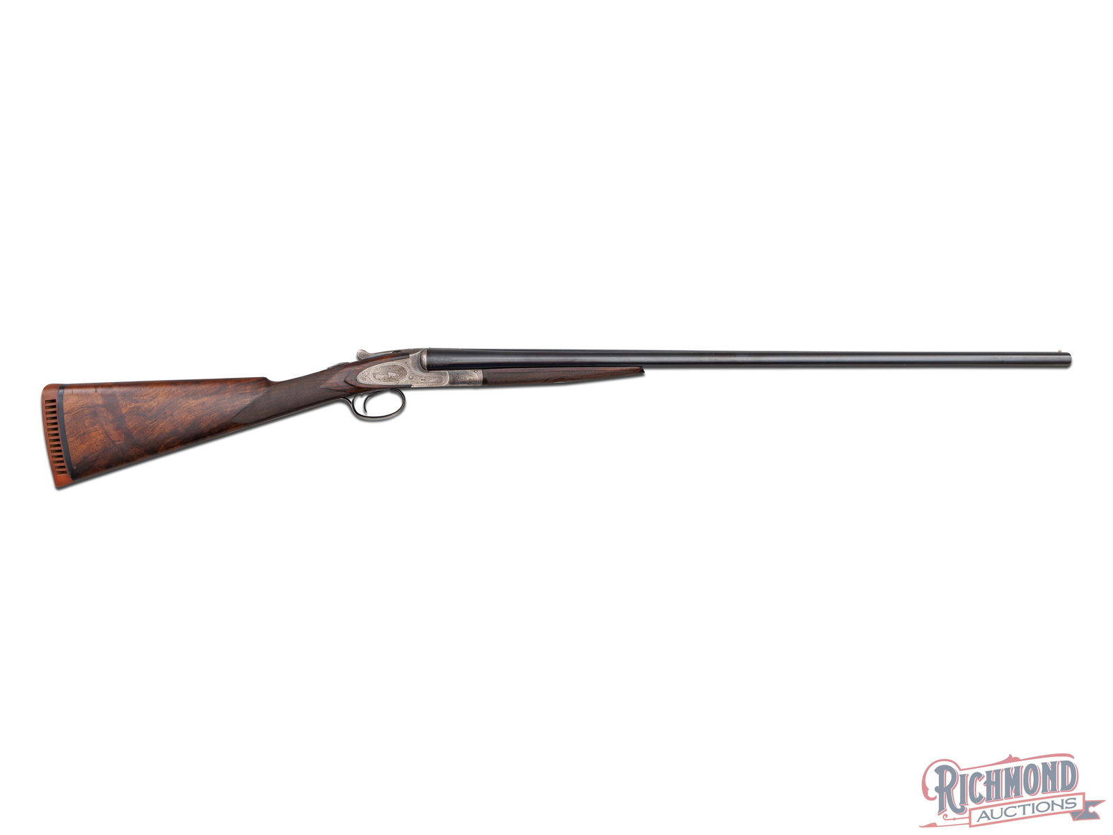 Rare L.C. Smith Crown Grade Side By Side Shotgun In 20 Gauge With Scarce 32" Barrels: Made by the Hunter Arms Company in 1913 in the second year of production for the Crown Grade. Gun has blued 32" Crown Steel barrels with 2-3/4" chambers, matted sighting plane with twin bead sights an