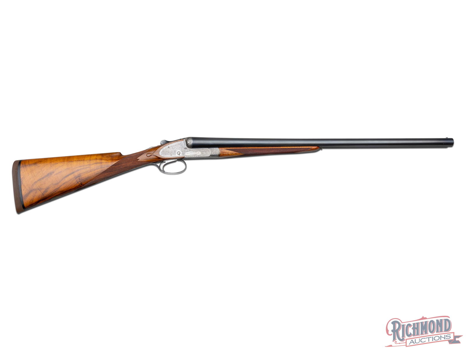 James Woodward & Sons Sidelock Ejector Side By Side Shotgun In 12 Gauge: Made by James Woodward & Sons of London, England circa 1913. According to factory research this gun was made for E. P. Rogers and was made to match gun No. 4593 identically forming a pair with barrels