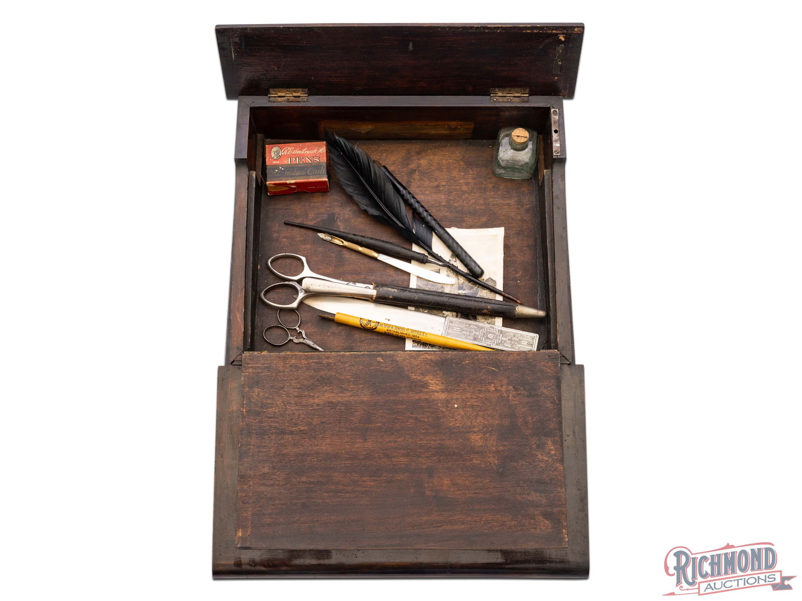 Carved Civil War Era Writing Desk with Accessories: Lot consists of Civil War Era Field desk made from Walnut or Mahoghany measuring 13" x 10-1/4" x 3-1/4". Two piece hinged lid with beautifully carved raised rose design and floral pattern with purple