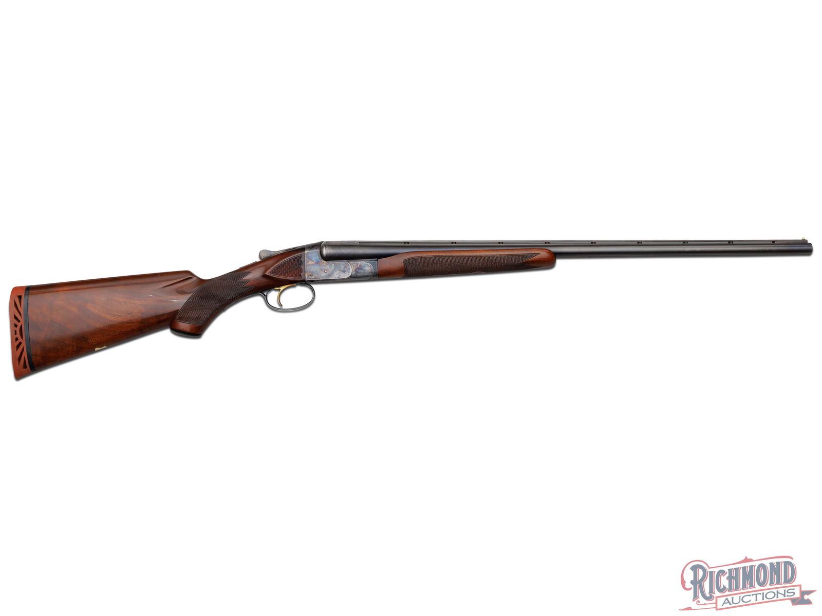 Highly Optioned NID Model Ithaca Field Grade SxS Shotgun With Ventilated Rib In Desirable 28 Gauge: Made by The Ithaca Gun Company in 1936. Gun has blued 26" Best Fluid Steel barrels with 2-3/4" chambers, factory ventilated rib with twin bead sight and ejectors. Gun has standard matting on rib with