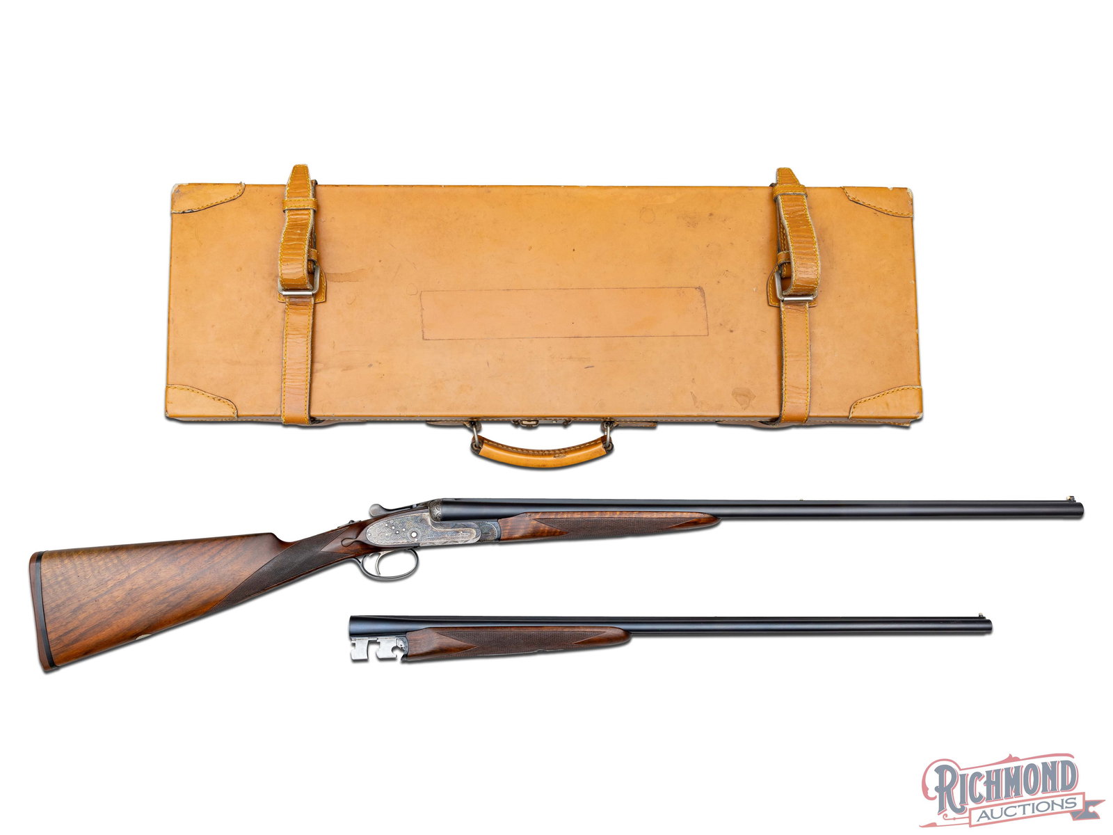 Factory Cased AYA No. 25 Two Barrel Set Sidelock Side by Side Shotgun in 28 Gauge/410 Caliber: Made by Aguirre Y Aranzabal of Eibar, Spain in 1983. Blued 27" Fluid Steel barrels with AYA marking and Address. 28 Gauge barrels have ejectors, Churchill rib with gold "AYA" at breech, twin bead sigh