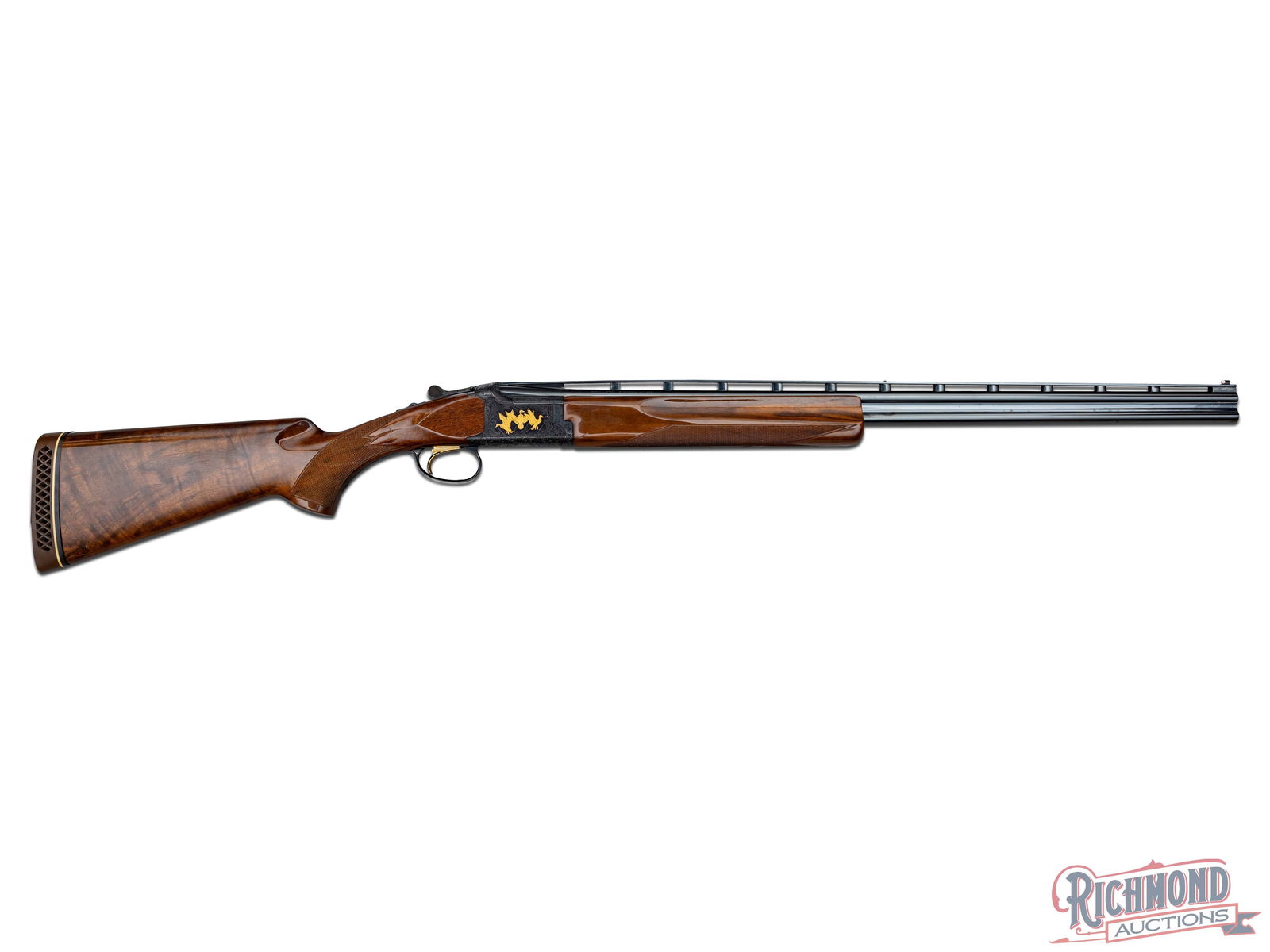 Engraved & Gold Inlaid Browning Citori Grade VI Skeet Over/Under Shotgun: Manufactured by Browning in 1987. This beautiful Citori features 28" ventilated rib Special Skeet barrels with white mid and front bead sights. 2-1/2" chambered for .410 gauge shells with Skeet over a