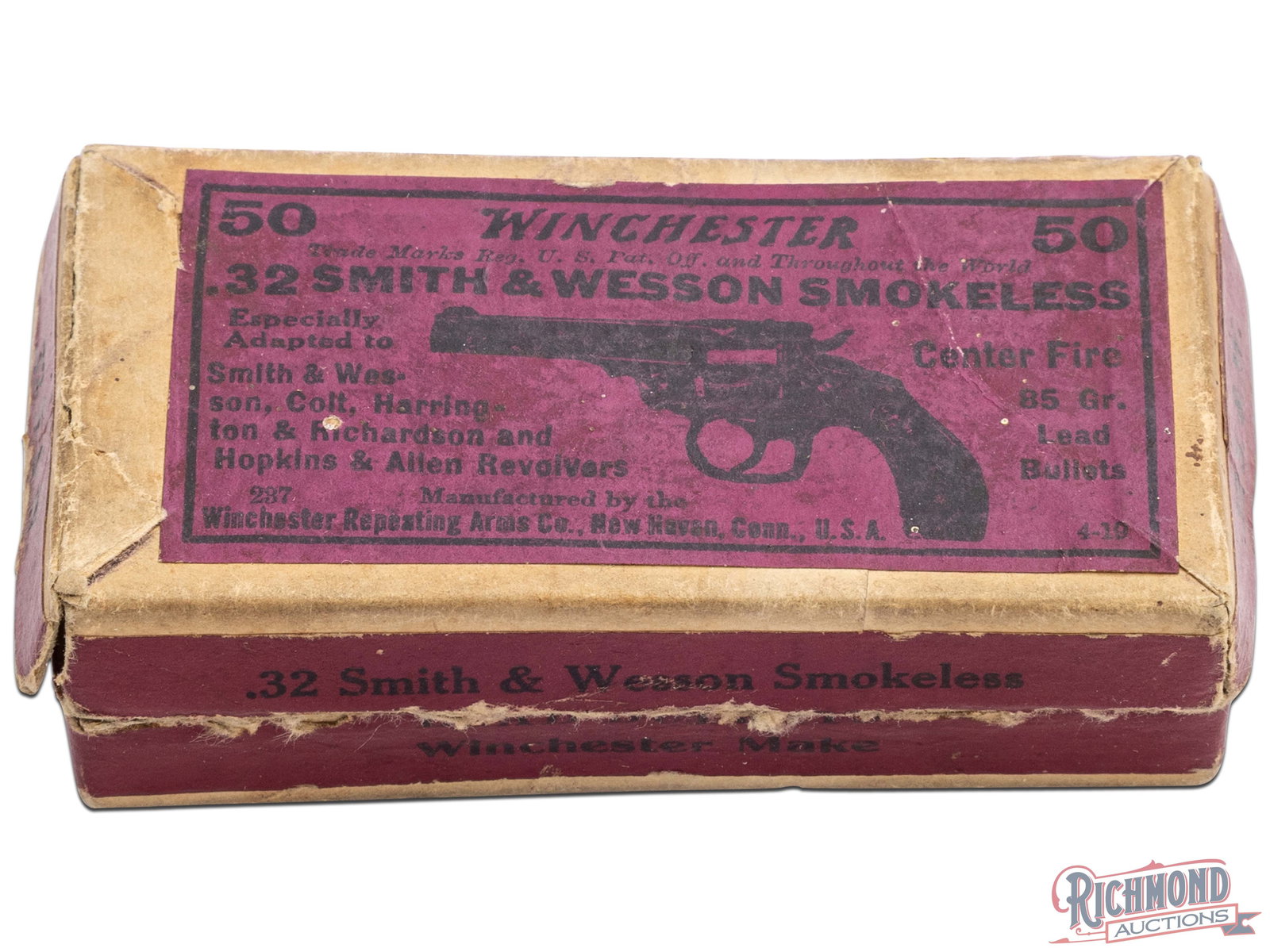Partial Box Of Winchester .32 Smith & Wesson Smokeless Centerfire Cartridges: This box contains 25 of 50 .32 S&W centerfire cartridges made by Winchester Repeating Arms Co. The plum colored label is on the top and sides has the image of a S&W revolver and states ".32 Smith & We