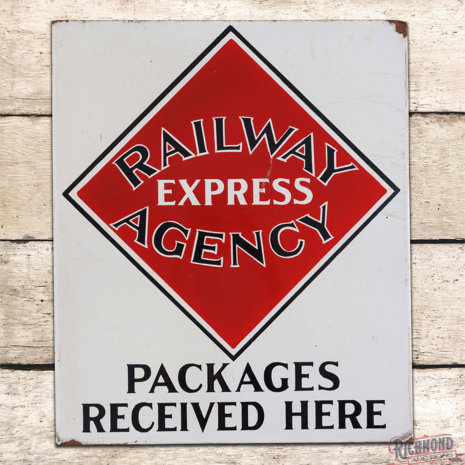 Railway Express Agency Packages Received Here Double Sided Porcelain Flange Sign w/ Logo: DSP (double sided porcelain) flange has excellent color and gloss. Side #1 has a clean field with minor discoloration and small chips along the outer edges. The reverse has fine scratches in the field