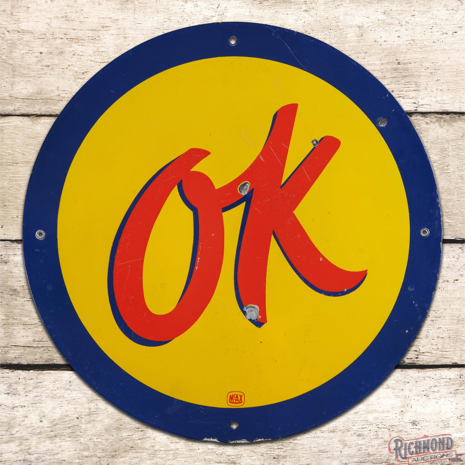 Chevrolet OK Used Cars 18" Single Sided Porcelain Logo Sign: SSP (single sided porcelain) sign has good color and gloss. The field has surface wear with chips and scratches. The perimeter has additional chips with spotting to the blue outer edges. Marked McAX. 