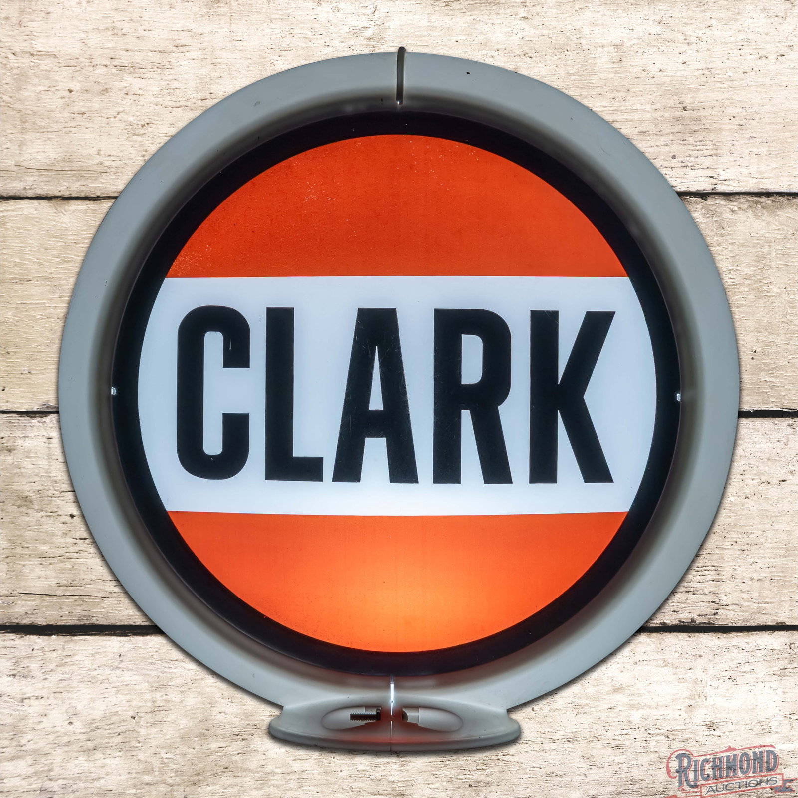 Clark Gasoline Complete 13.5" Capco Body Gas Pump Globe: Two 13.5" lenses mounted in a Capco body have very good color. The display lens has surface wear with discoloration along the perimeter. The reverse lens has similar wear with a dime-sized paint chip 