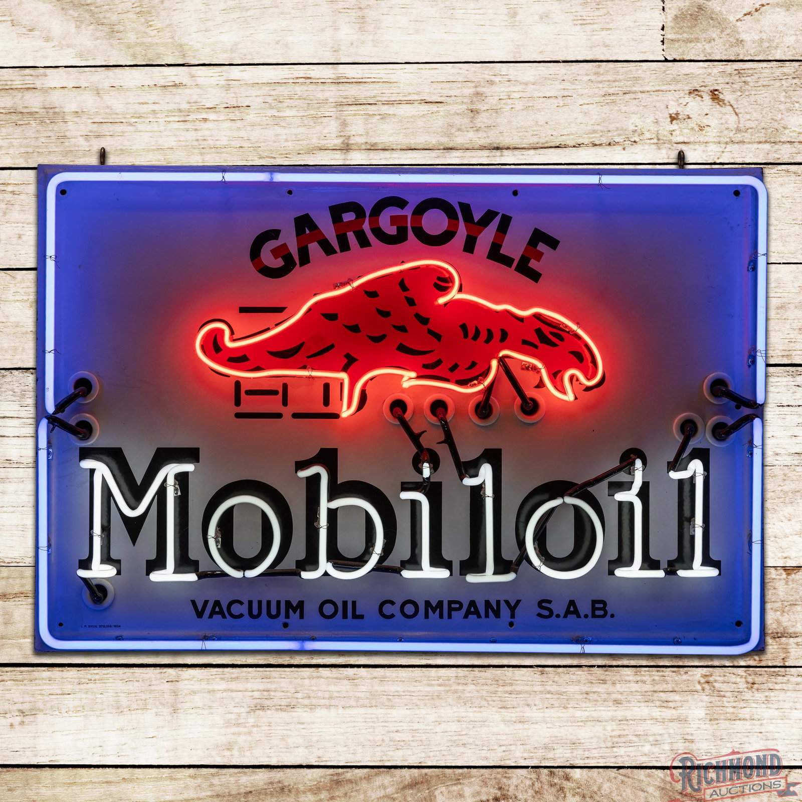 Gargoyle Mobiloil Vacuum Oil Company 4' Single Sided Porcelain Neon Sign: SSP (single sided porcelain) self-framed sign with added neon and a metal can has excellent color and gloss. The display has light surface wear with a color matched chip on the left side of the gargoy