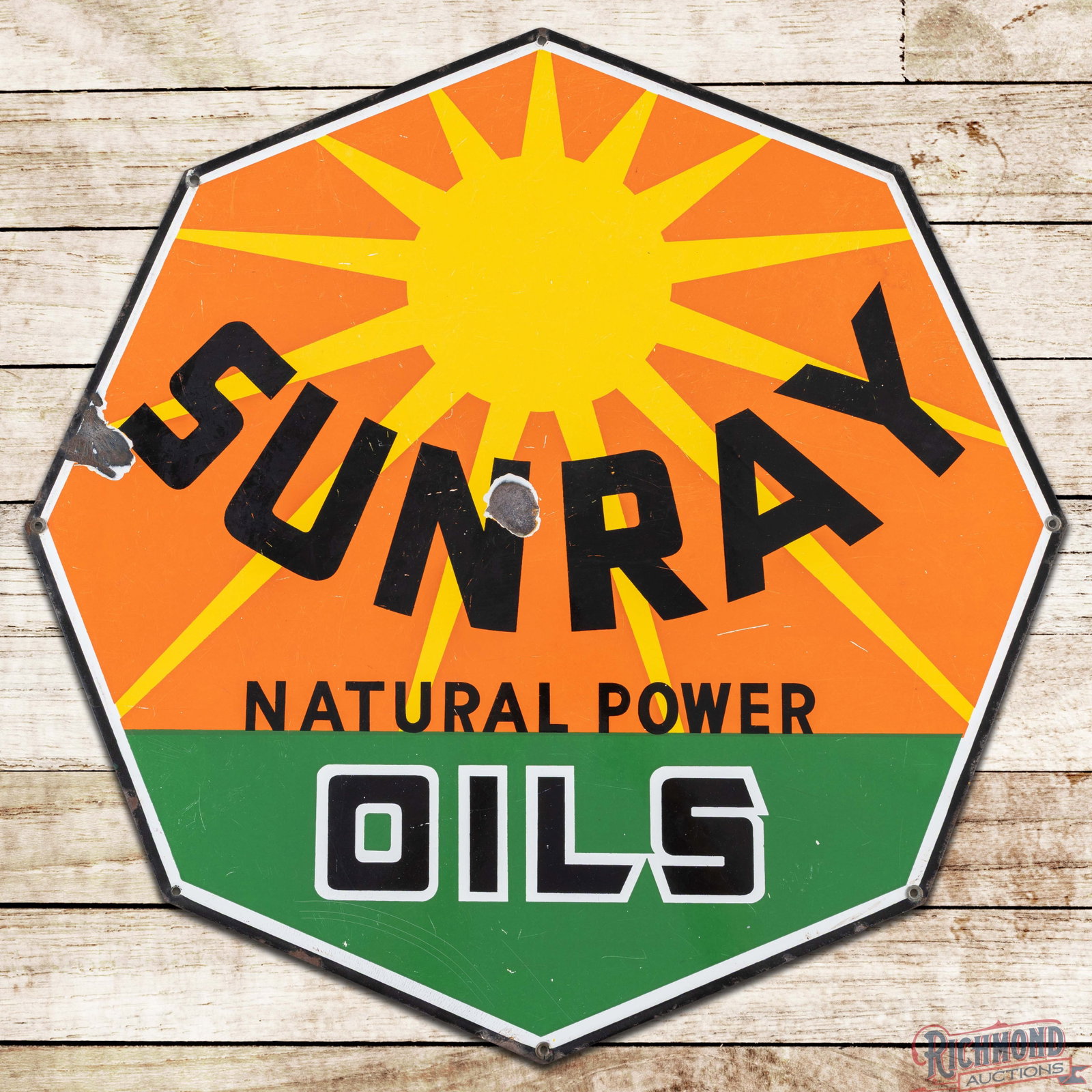 Sunray Natural Power Oils 27" Die Cut Single Sided Porcelain Sign: SSP (single sided porcelain) die cut sign has good color and gloss. The field has surface wear with scratches and a chip in the "N" of Sunray. The perimeter has a larger chip on the left hand edge wit