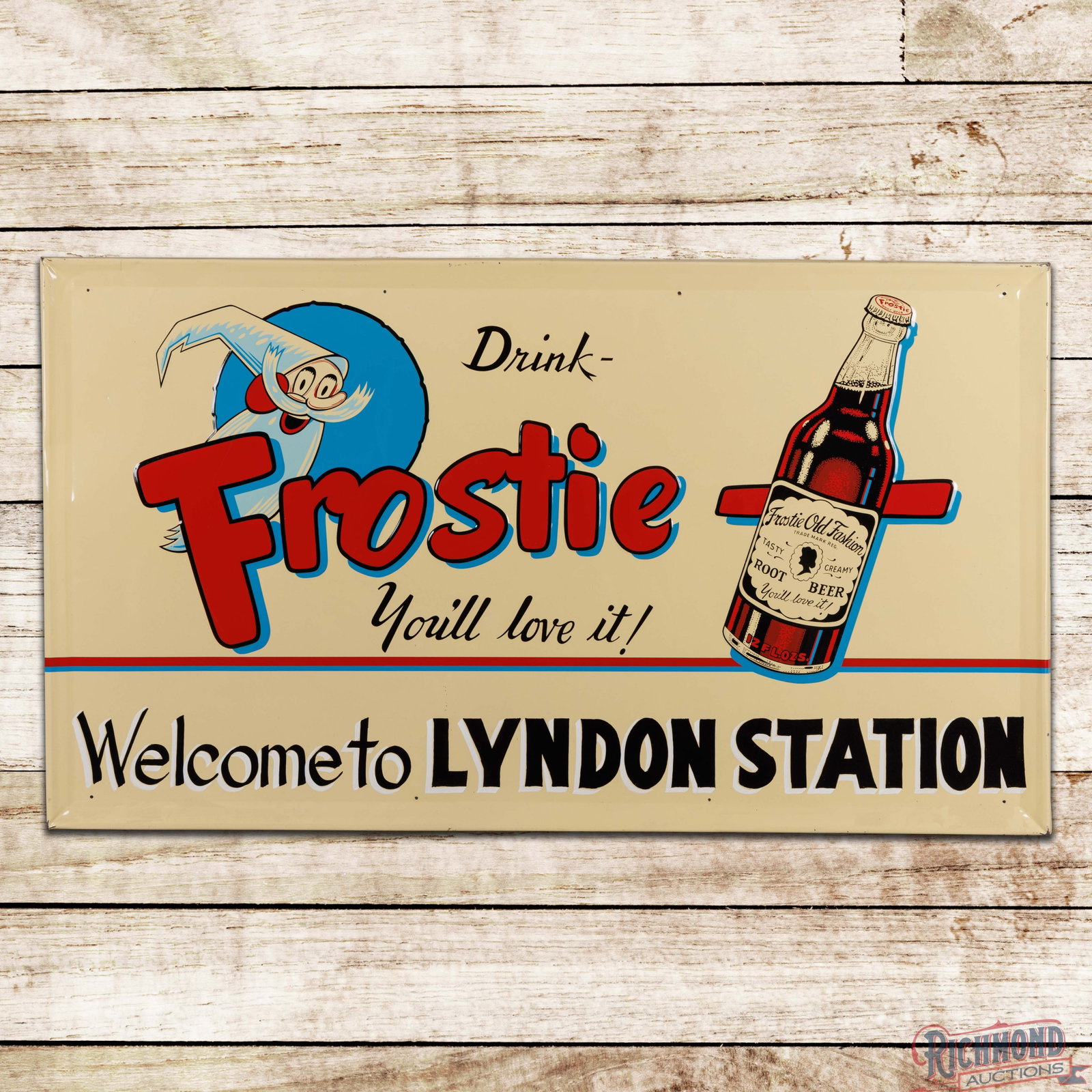 Drink Frostie Root Beer "You'll Love it!" 56" Emb. Single Sided Tin Sign Lyndon Station: SST (single sided tin) embossed self-framed sign has outstanding color and shine. The display is very clean overall with tiny nicks in the lower field and minor indentations in the outer fields. The p