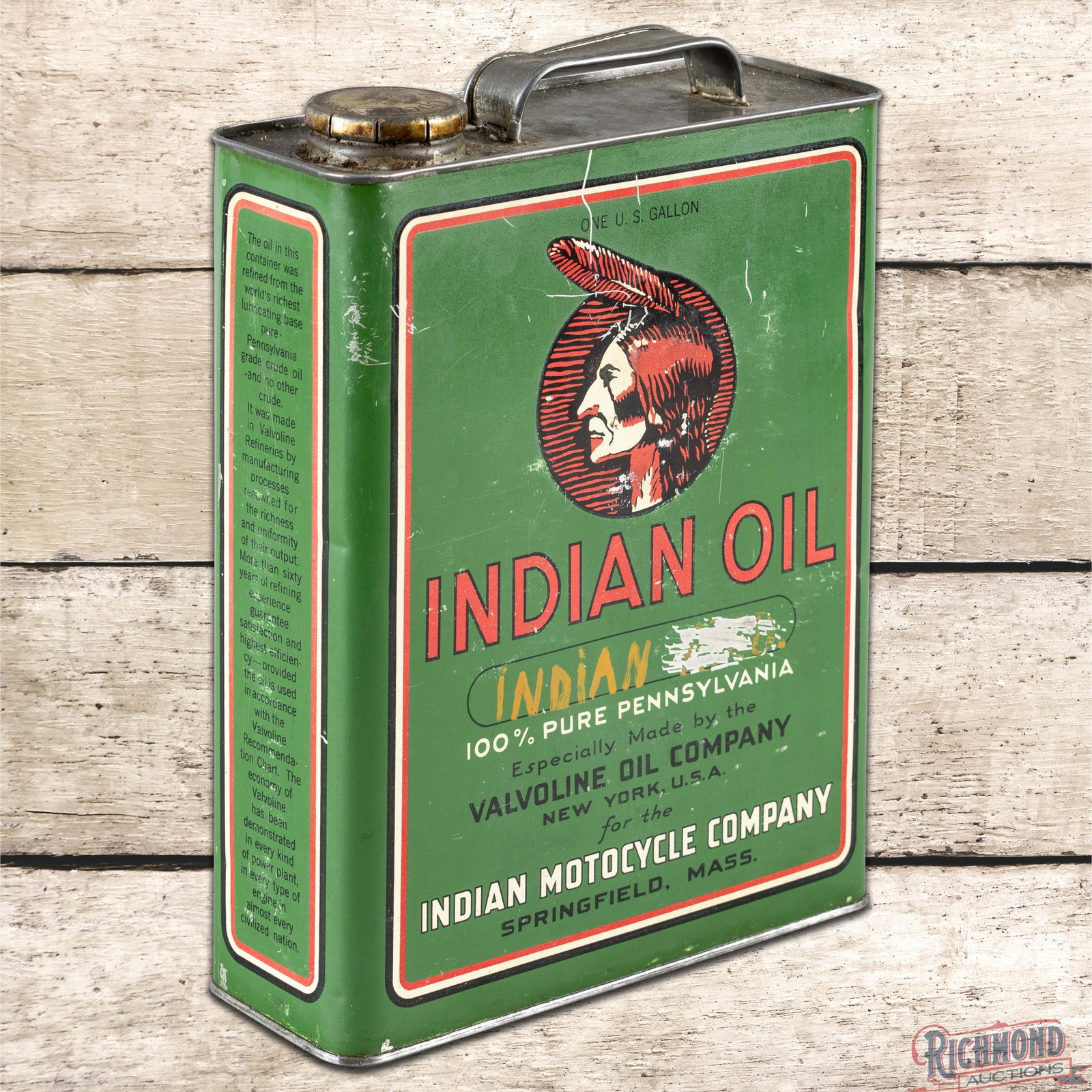Indian Motorcycle Oil Valvoline Oil Co. One Gallon Metal Can w/ Native American: Empty one gallon metal can has very good color. The display has fine scratches with heavier scratches to the right of the hand written "Indian" lettering in the privilege area. The perimeter has a sma