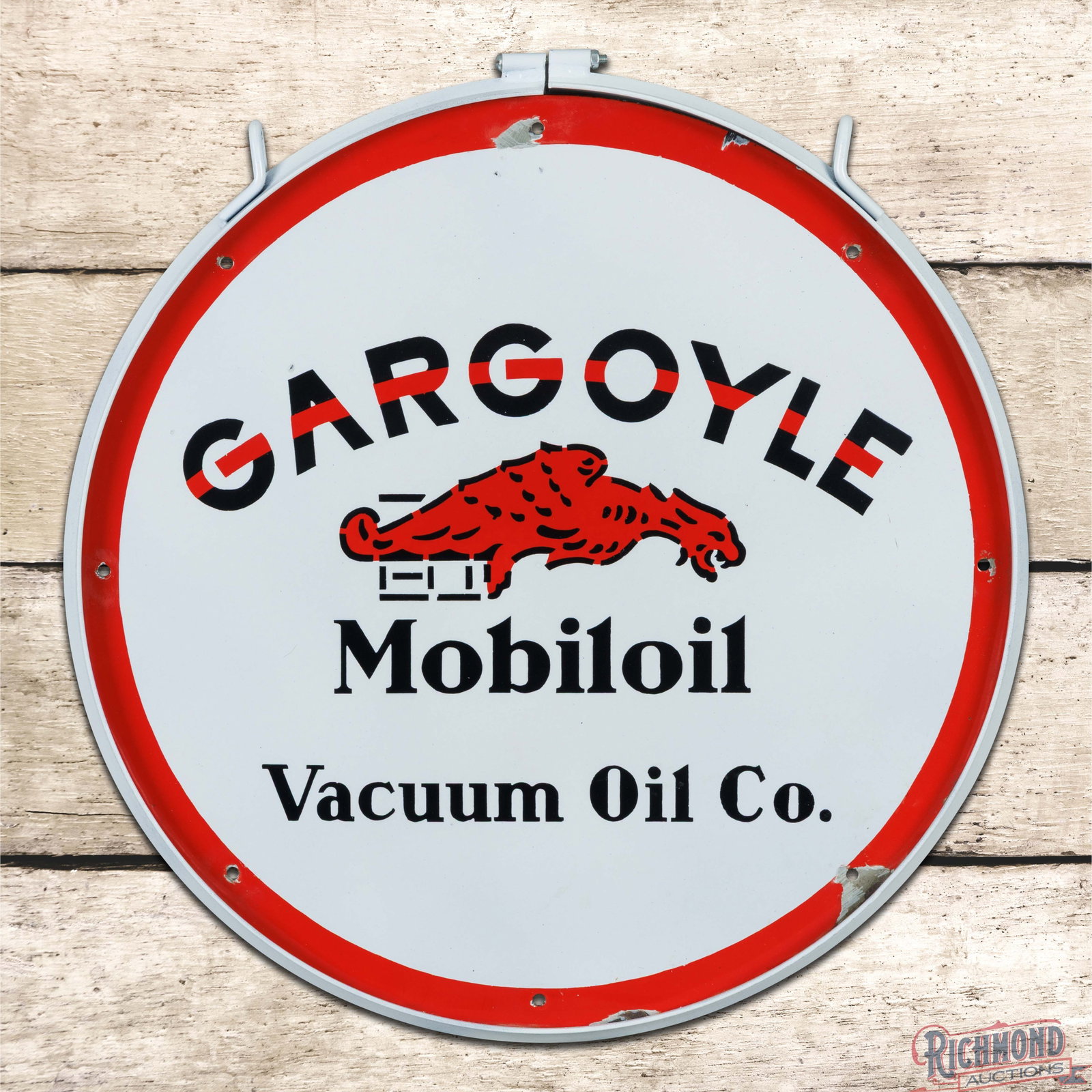 Rare Gargoyle Mobiloi Vacuum Oil Co.. 24" Single Sided Porcelain Sign w/ Ring: SSP (single sided porcelain) sign has outstanding color and gloss. The field is clean. The perimeter has chips at some of the mounting holes and outer edges. The sign is mounted in a new metal ring wh
