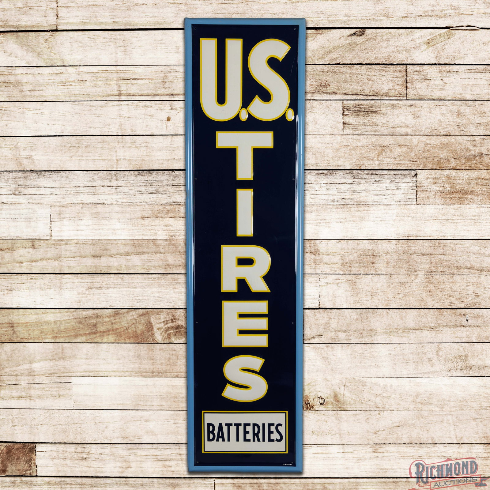 1941 U.S. Tires 6' Emb. Single Sided Tin Sign: SST (single sided tin) embossed self-framed sign has excellent color and shine. The display has paper marks with a tiny color-matched chip in the "U." The outer fields and perimeter have light wear wi