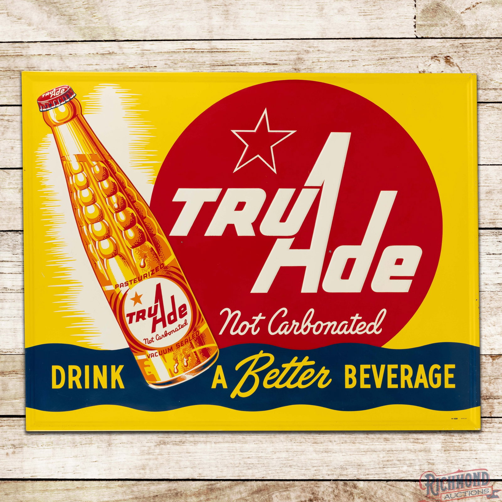 Amazing 1954 Drink Tru Ade "A Better Beverage" 57" Emb. Single Sided Tin Sign w/ Bottle: SST (single sided tin) embossed self-framed sign with the factory wooden support frame has excellent color and shine. The display is extremely clean overall with minor surface imperfections and a few 