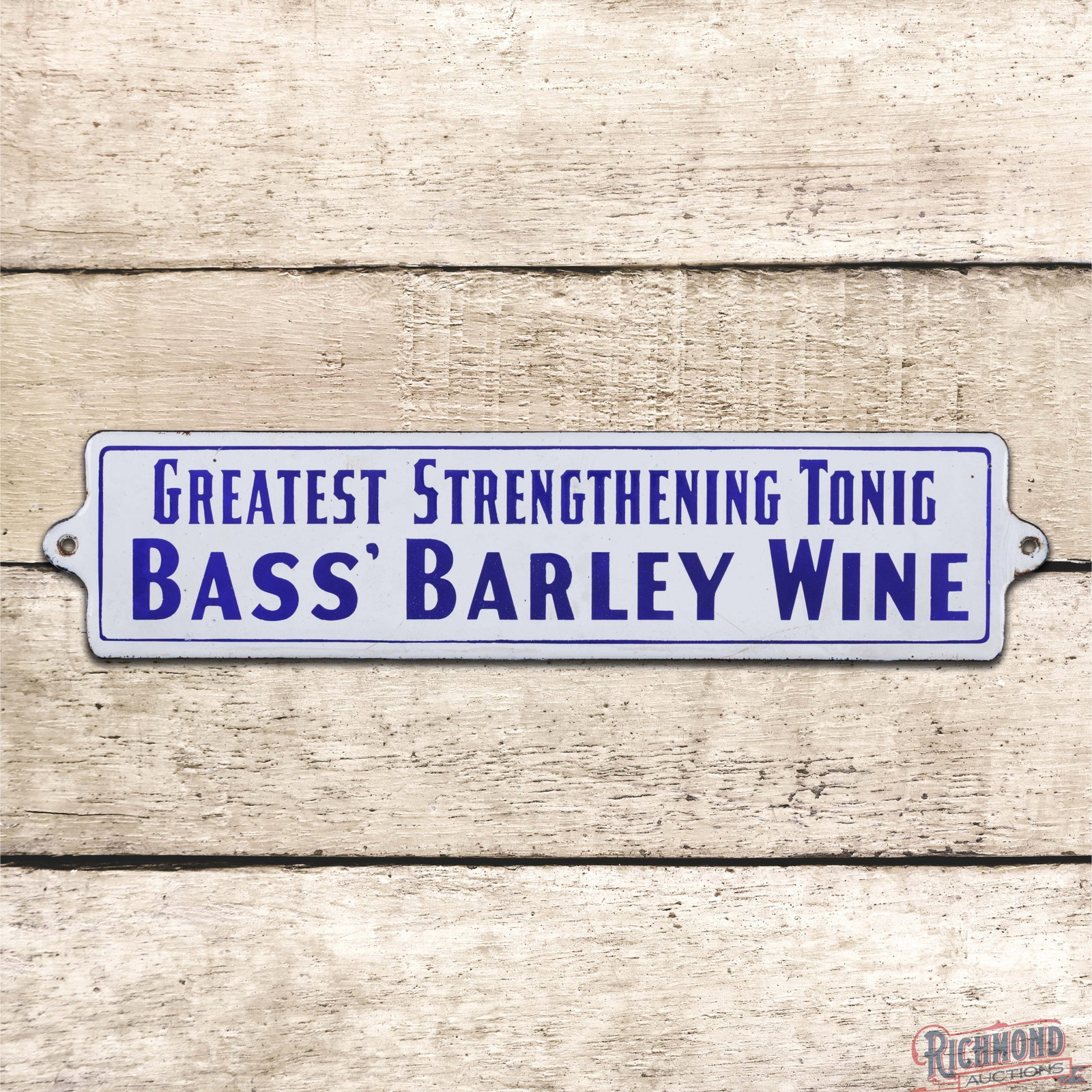 Bass' Barley Wine "Greatest Strength Tonic Single Sided Porcelain Sign: SSP (single sided porcelain) rolled edge sign has excellent color and gloss. The display has light surface wear. The perimeter has slight crazing at the right hand mount hole with minor edge wear. Ove