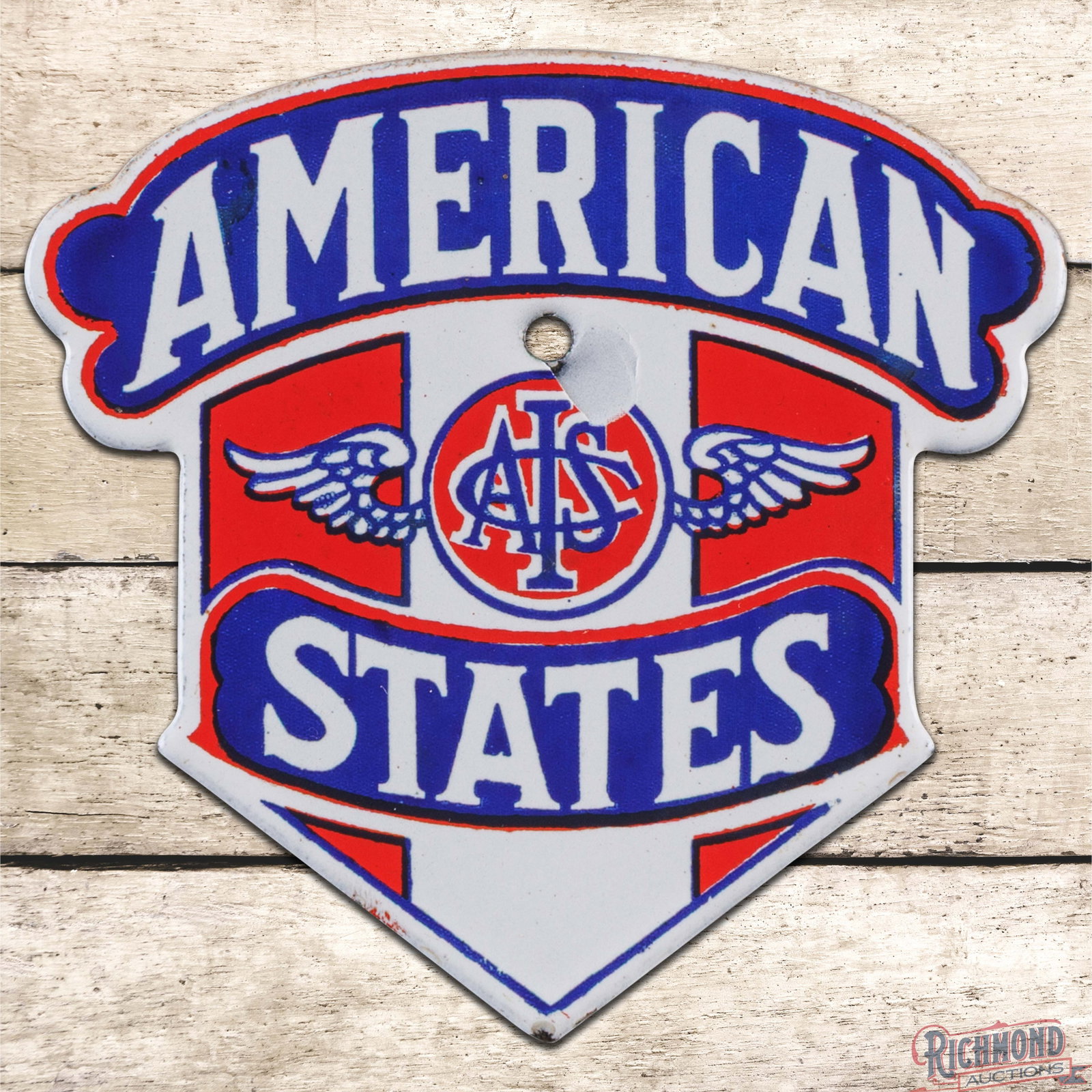 American States Insurance Company 4" Single Sided Porcelain Auto Radiator Emblem Badge Sign: SSP (single sided porcelain) die cut sign has excellent color and gloss. The sign has a flake by the mounting hole and a tiny flea bite on the lower tip. Overall a scarce sign with strong eye appeal. 