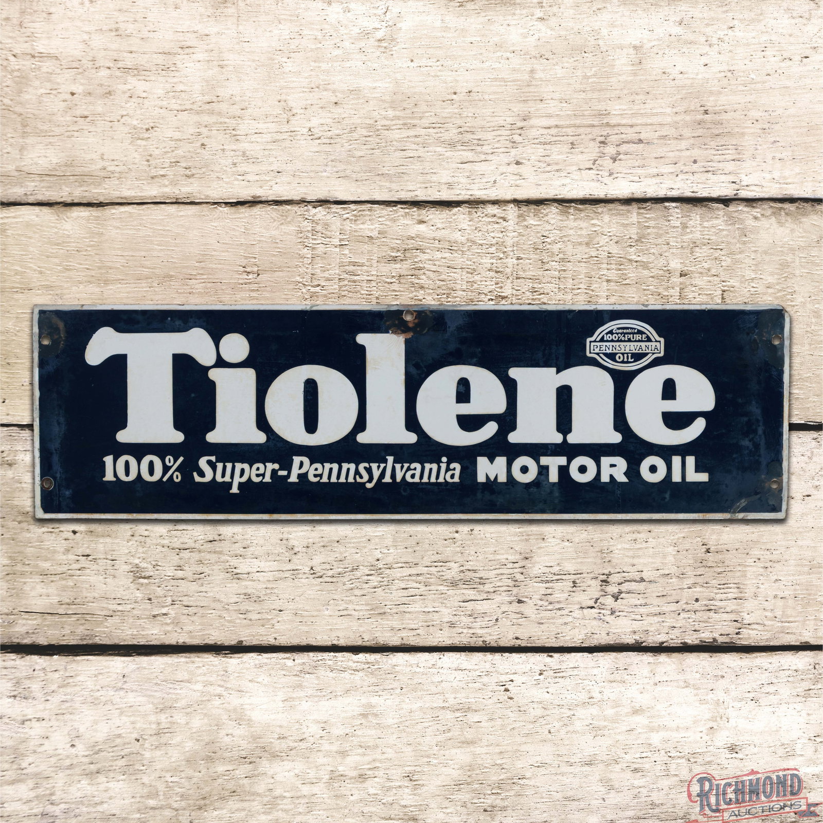 Pure Tiolene 100% Super-Pennsylvania Motor Oil Single Sided Porcelain Logo Sign: SSP (single sided porcelain) sign has moderate color and gloss. The display is cloudy with areas of lower gloss and discoloration. The perimeter has wear with wear, crazing, color-matched chips and me