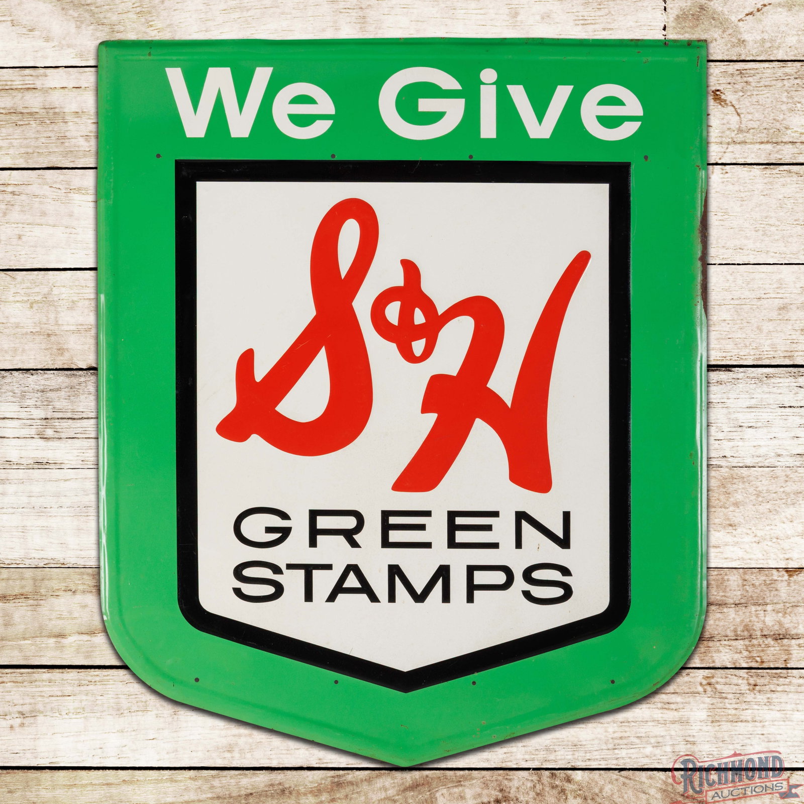 We Give S&H Green Stamps 42" Single Sided Tin Sign: SST (single sided tin) die cut embossed self-framed sign has very good color and shine. The field has small fine scratches with areas of discoloration in the white in the lower portions of the logo. T