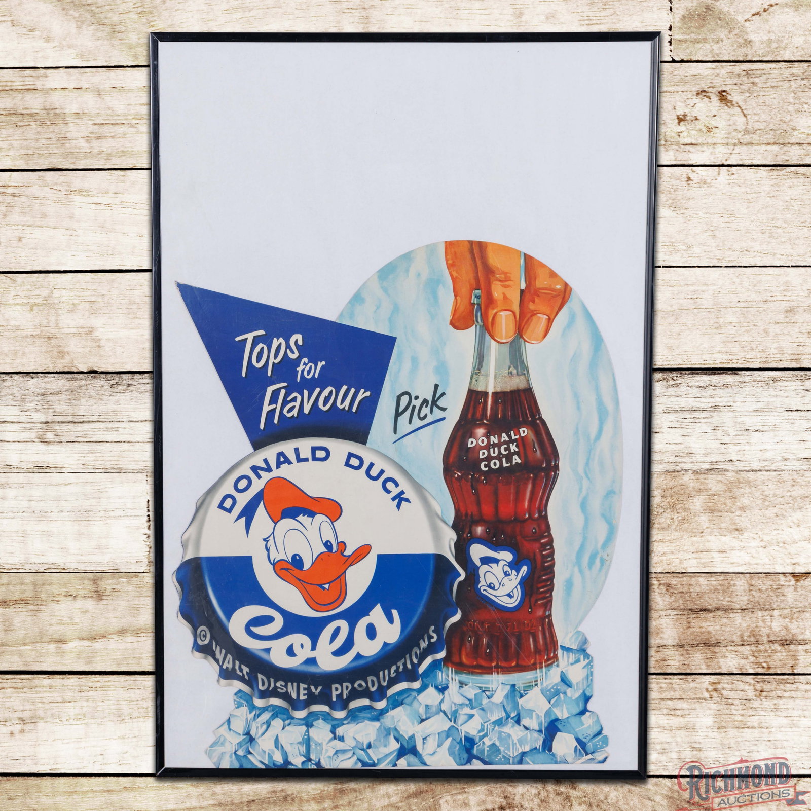 Walt Disney Donald Duck Cola "Tops for Flavor" Die Cut SS Cardboard Sign: Single sided die-cut cardboard sign has been framed under plexiglass. The field is very clean overall, showing minor surface imperfections. The perimeter has light wear on the upper left point with ot