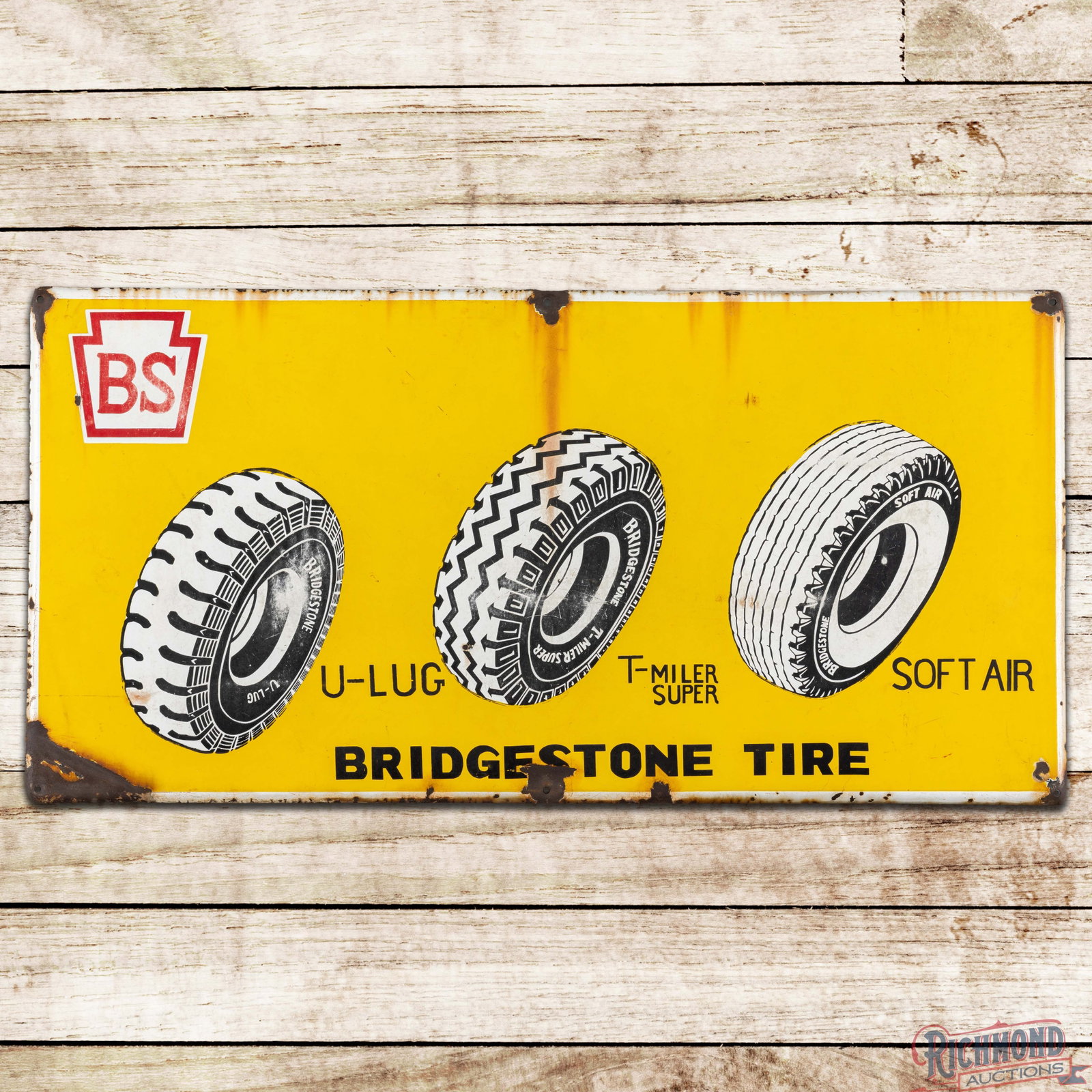 Bridgestone Tire 39" Single Sided Porcelain Sign w/ Logo: SSP (single sided porcelain) rolled edge sign has good color and moderate gloss. The display has surface wear with discoloration. The perimeter has additional wear with chips, discoloration and a bend