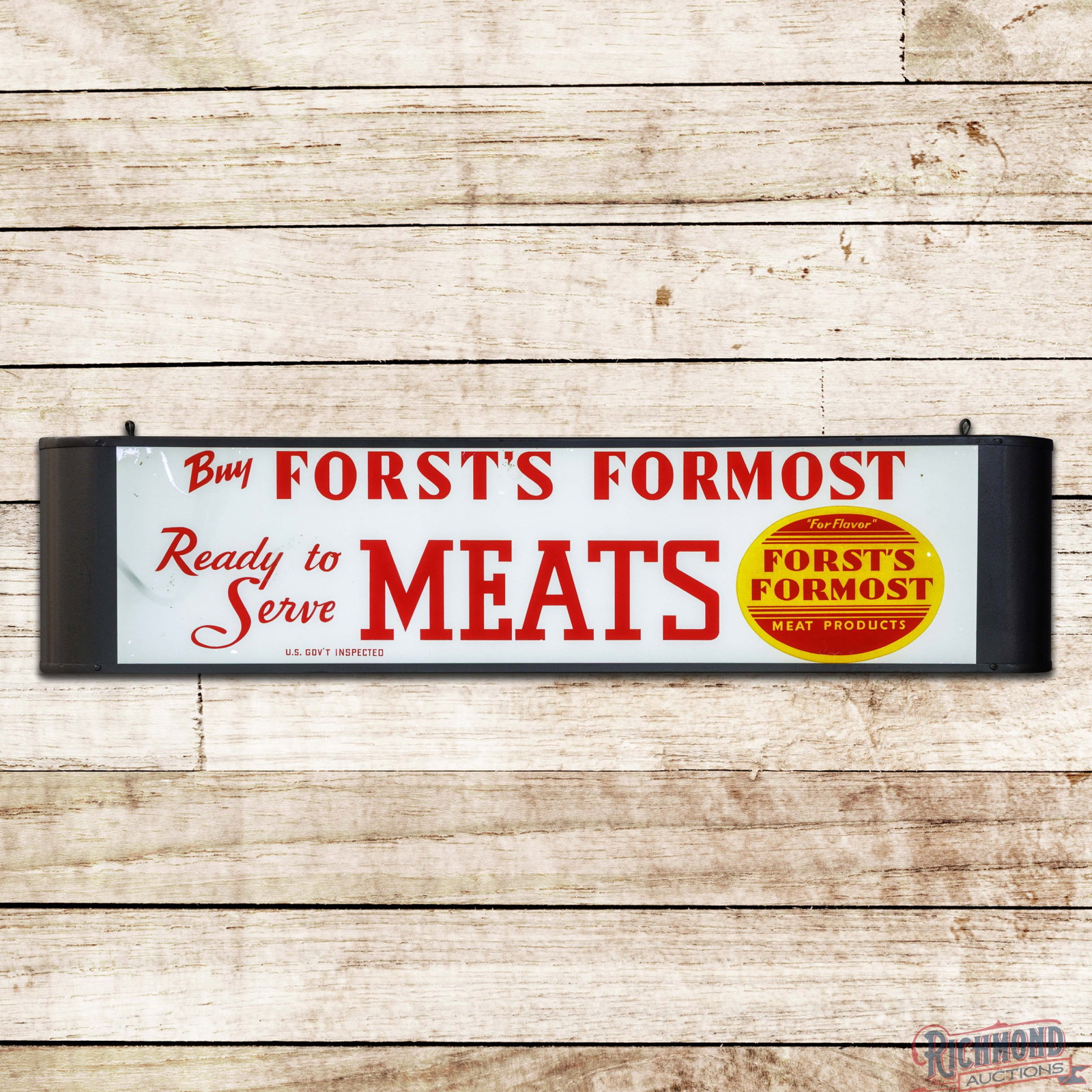 Buy Forst's Formost Ready to Serve Meats Lighted Reverse Glass Advertising Sign: Reverse on glass sign with the factory metal can has good color. The glass face has small paint chips in the field with discoloration in the left fields. The perimeter has additional paint loss, which