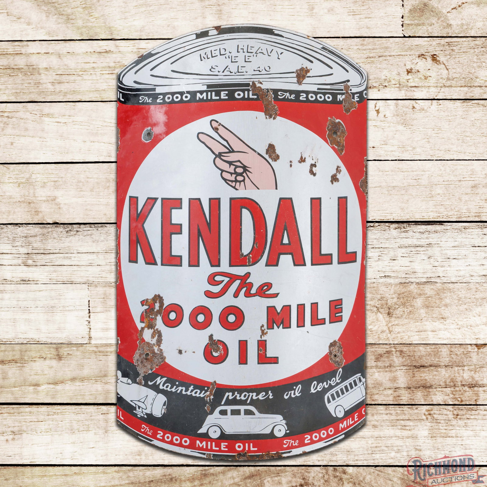 Kendall The 2000 Mile Oil Single Sided Porcelain Curved 30" Oil Can Shaped Sign: SSP (single sided porcelain) curved sign has good color and moderate gloss. The field exhibits general wear with crazing, chips and areas of cloudiness. The perimeter has chips along the outer edges w