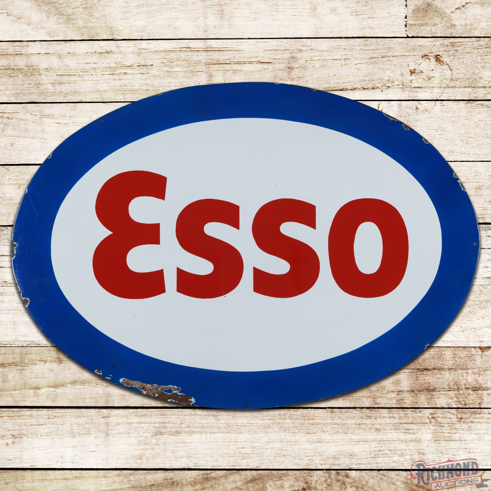 Esso Gasoline Motor Oils 45" Single Sided Porcelain Logo Sign: SSP (single sided porcelain) sign has excellent color and gloss. The field is very clean overall with minor surface imperfections. The perimeter has small chips along the edges and a larger chip on th