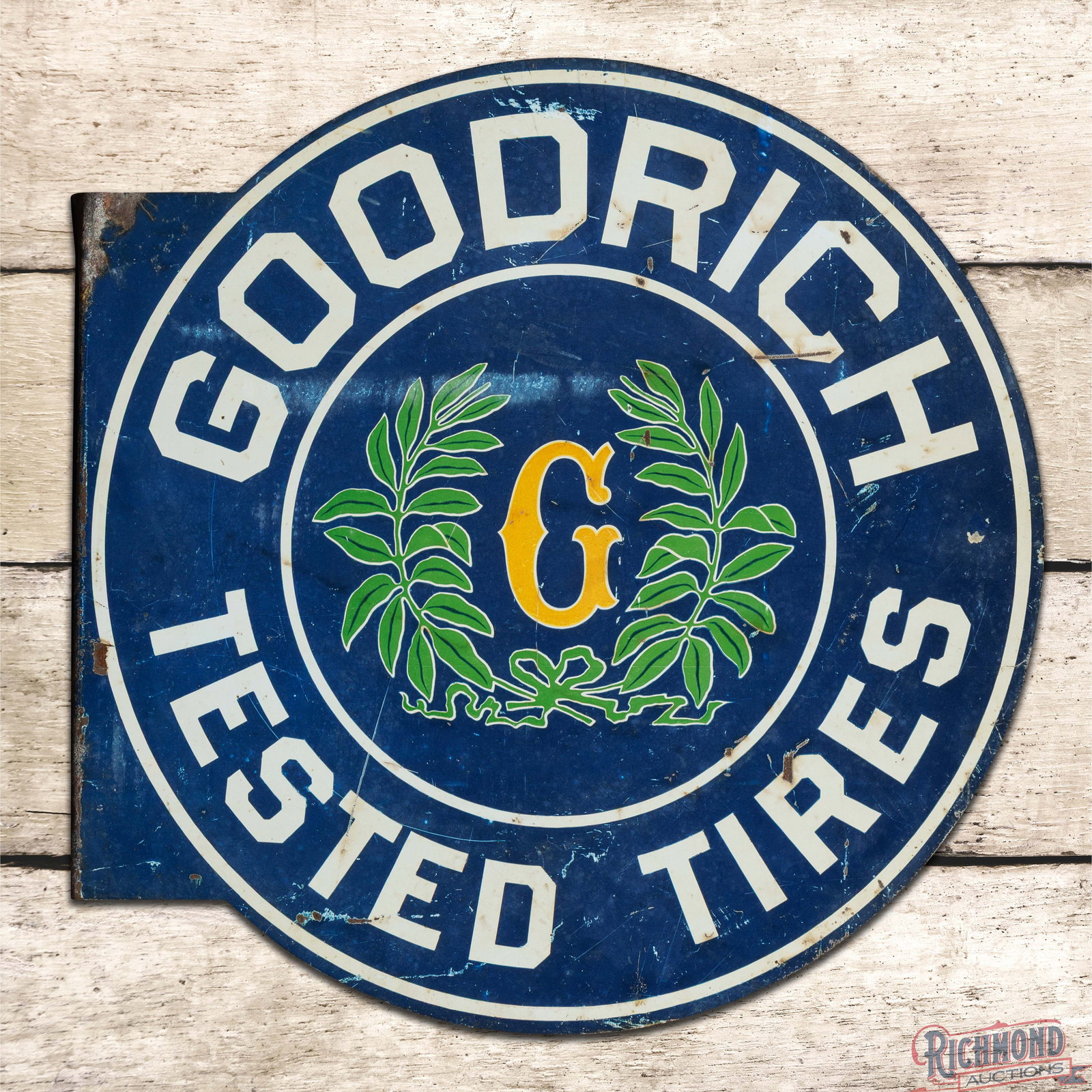 Early Goodrich Tested Tires Double Sided Tin Flange Sign w/ Logo: DST (double sided tin) flange has good color and shine. Side #1 has general surface wear with scratches, paint chips and wash in the upper and outer fields. The perimeter has oxidation with paint loss