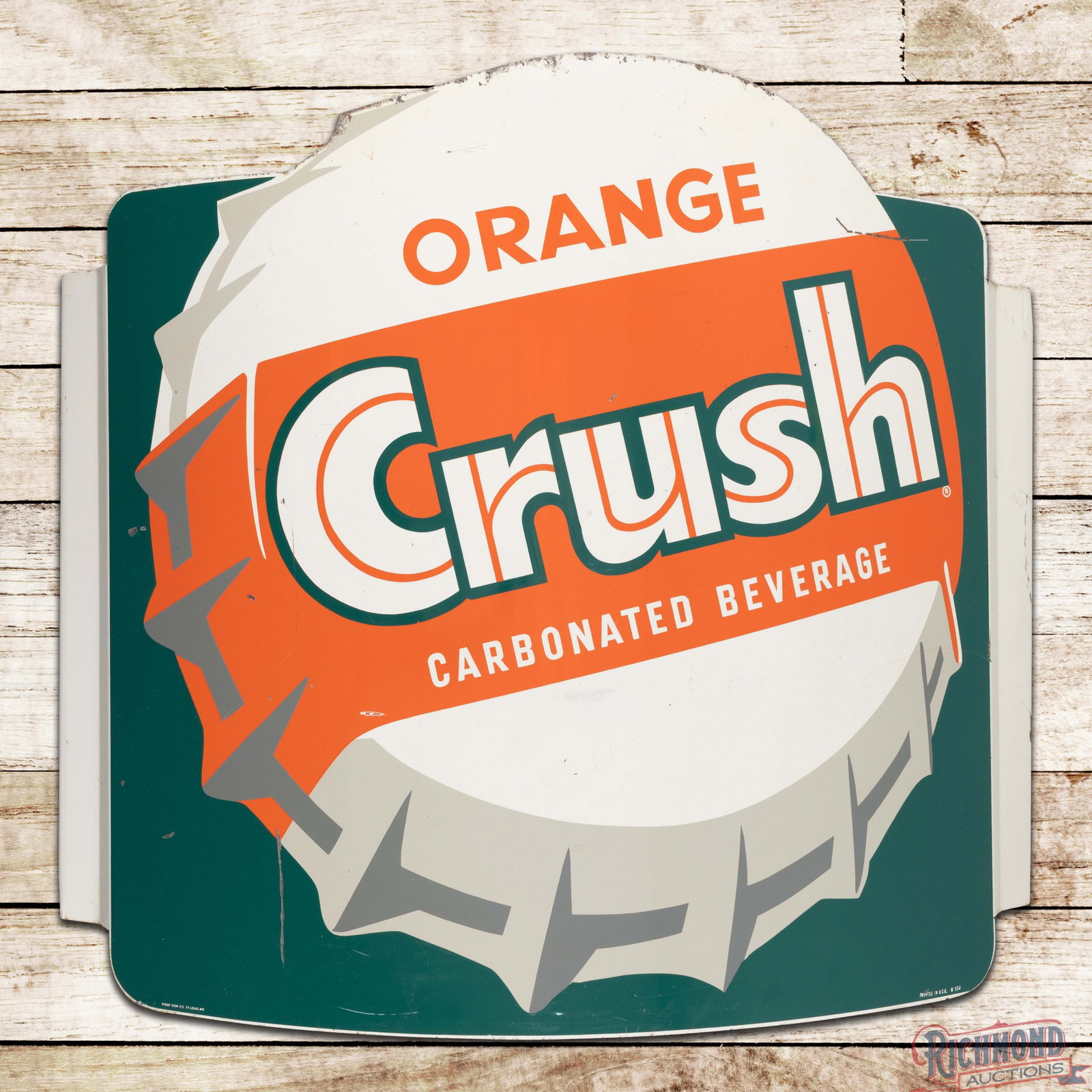 Orange Crush Carbonated Beverage Die Cut Single Sided Tin Curved Sign w/ Bottlecap: SST (single sided tin) die cut curved sign with mounting brackets has very good color and shine. The field has light wear with small fine scratches and paint chips. The outer fields and perimeter have