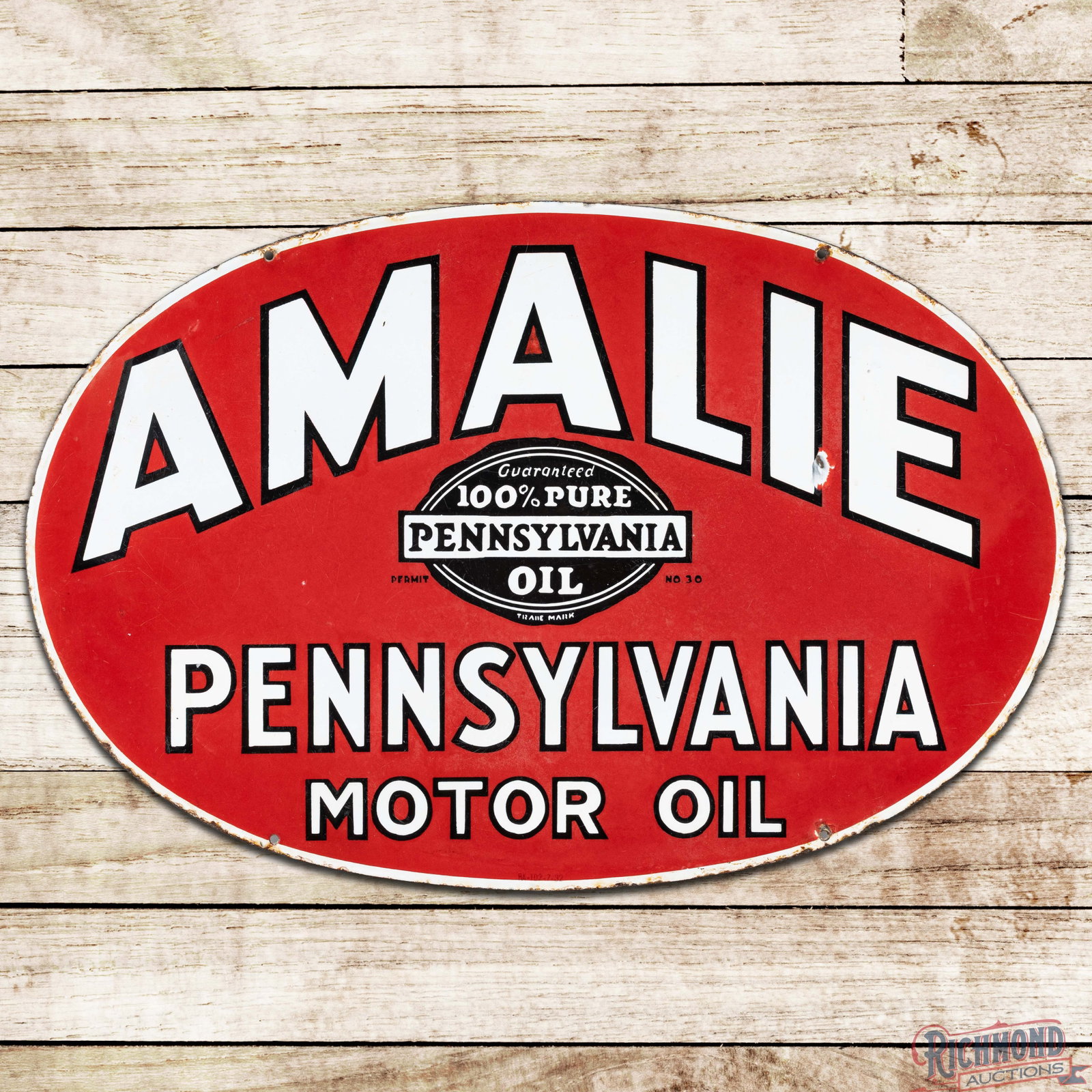 1932 Amalie 100% Pure Pennsylvania Motor Oil 30" Double Sided Porcelain Sign w/ Logo: DSP (double sided porcelain) sign has good color and gloss. The display has a tiny flake in the logo, fine scratches with areas of discoloration, lower gloss and a small bruise in the upper lettering.