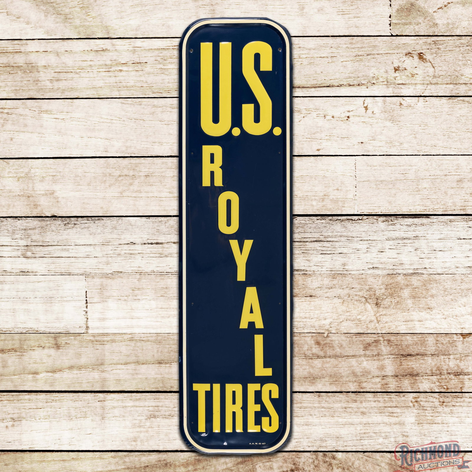 1947 U.S. Royal Tires 5' Emb. Single Sided Tin Sign: SST (single sided tin) embossed self-framed sign has excellent color and shine. The field has a few fine scratches with small indentations in the outer fields. The perimeter has light wear with a smal