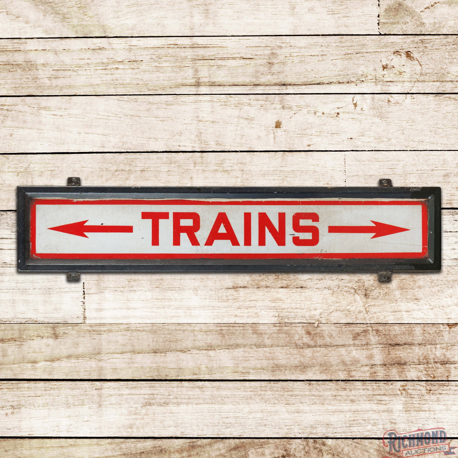 Railroad Trains 4' Single Sided Porcelain Self-Framed Sign w/ Directional Arrows: SSP (single sided porcelain) self-framed sign has good color and gloss. The display has areas of discoloration with errant paint drips. The perimeter exhibits a full repaint with areas of paint chippi