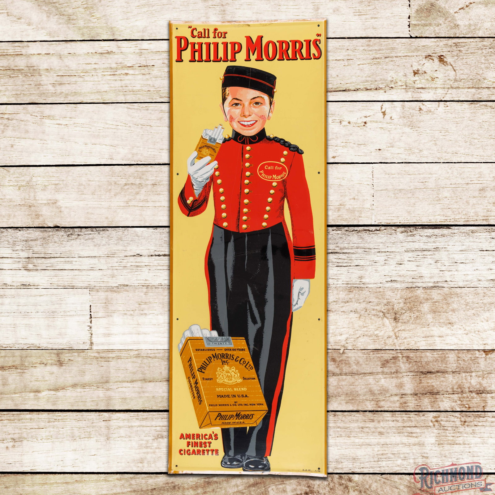 1952 Call for Philip Morris America's Finest Cigarette Emb. Single Sided Tin Sign w/ Johnny: SST (single sided tin) embossed self-framed sign has excellent color and shine. The display has light wear with a vertical scratch through the Johnny graphic. The perimeter has bends, scratches and sm