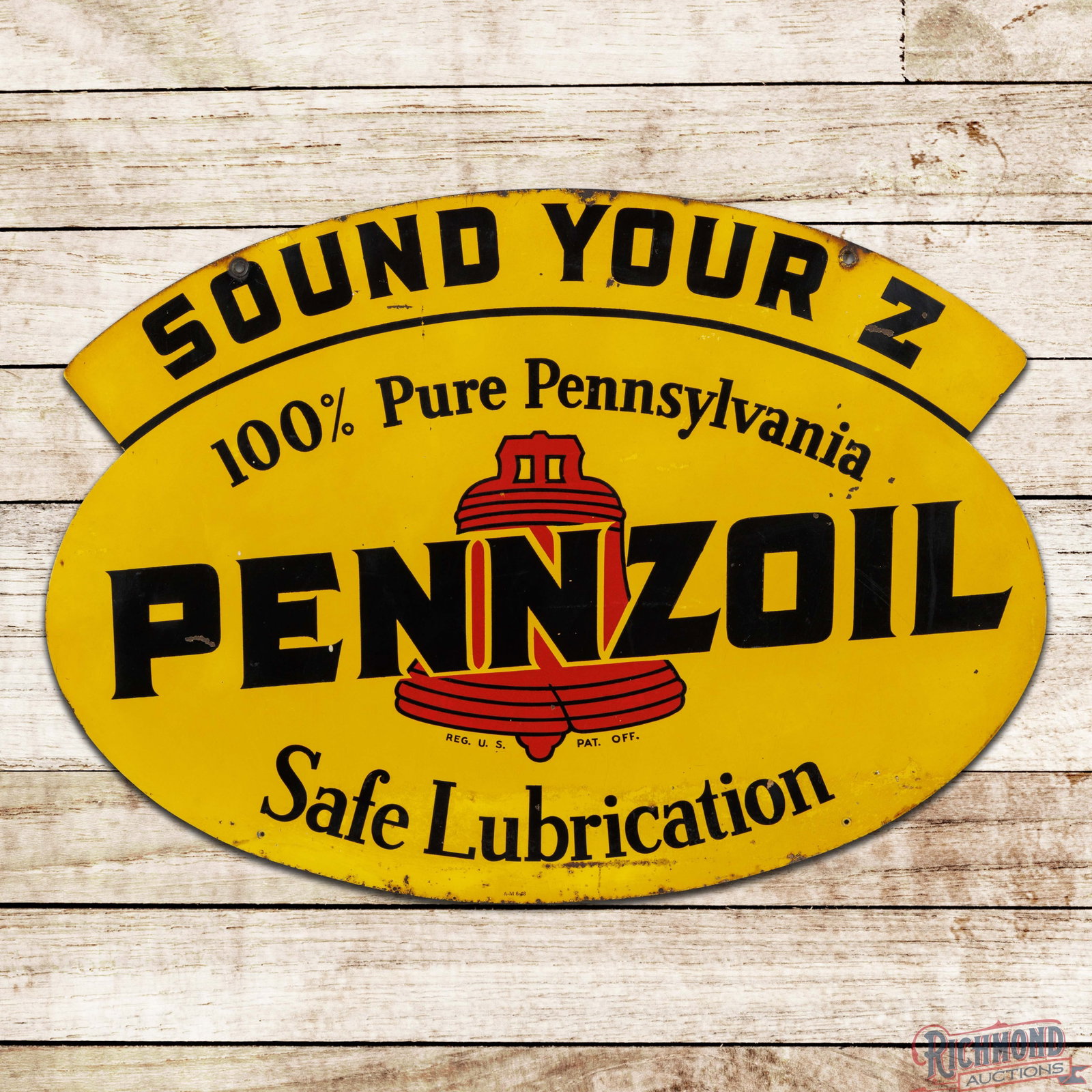 1948 Pennzoil Safe Lubrication "Sound Your Z" Double Sided Tin Sign: DST (double sided tin) die cut sign has good color and shine. The display has wear with paint chips, discoloration and wear. The perimeter has two small non-factory holes on the lower edges with oxida