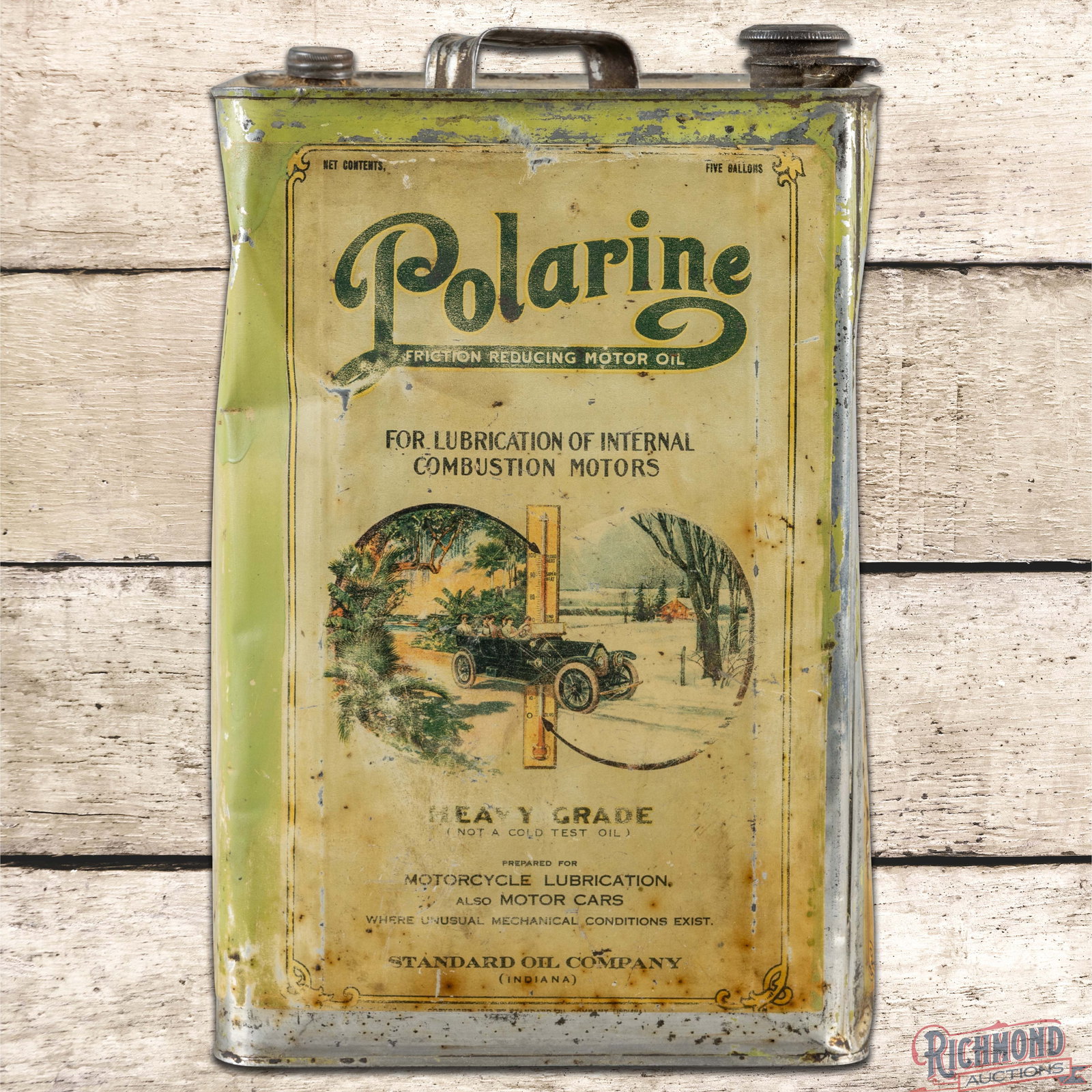 Standard Polarine Motorcycle & Motor Cars 5 Gallon Metal Can w/ Early Automobile: Empty five gallon motor oil can has good color and moderate shine. The display has general wear with toning, fine scratches and dents. The reverse has larger areas of paint loss with areas of oxidatio