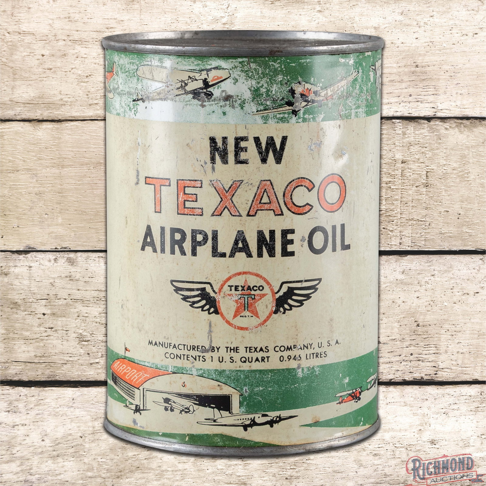 Rare New Texaco Airplane Oil Metal 1 Quart Oil Can: Empty metal one quart can has good color and moderate shine. The can has outstanding graphics of an airport scene with planes, hanger and the winged Texaco logo. The display has surface wear with fine