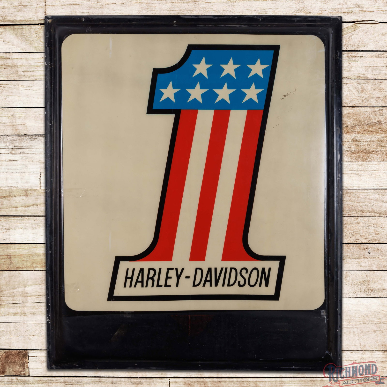 Harley Davidson #1 Logo 6' SS Plastic Sign Panel: Single sided convex plastic sign panel has very good color. The display has toning to the white background with paint chips, small dings and fine scratches. The lower outer field has errant red paint 