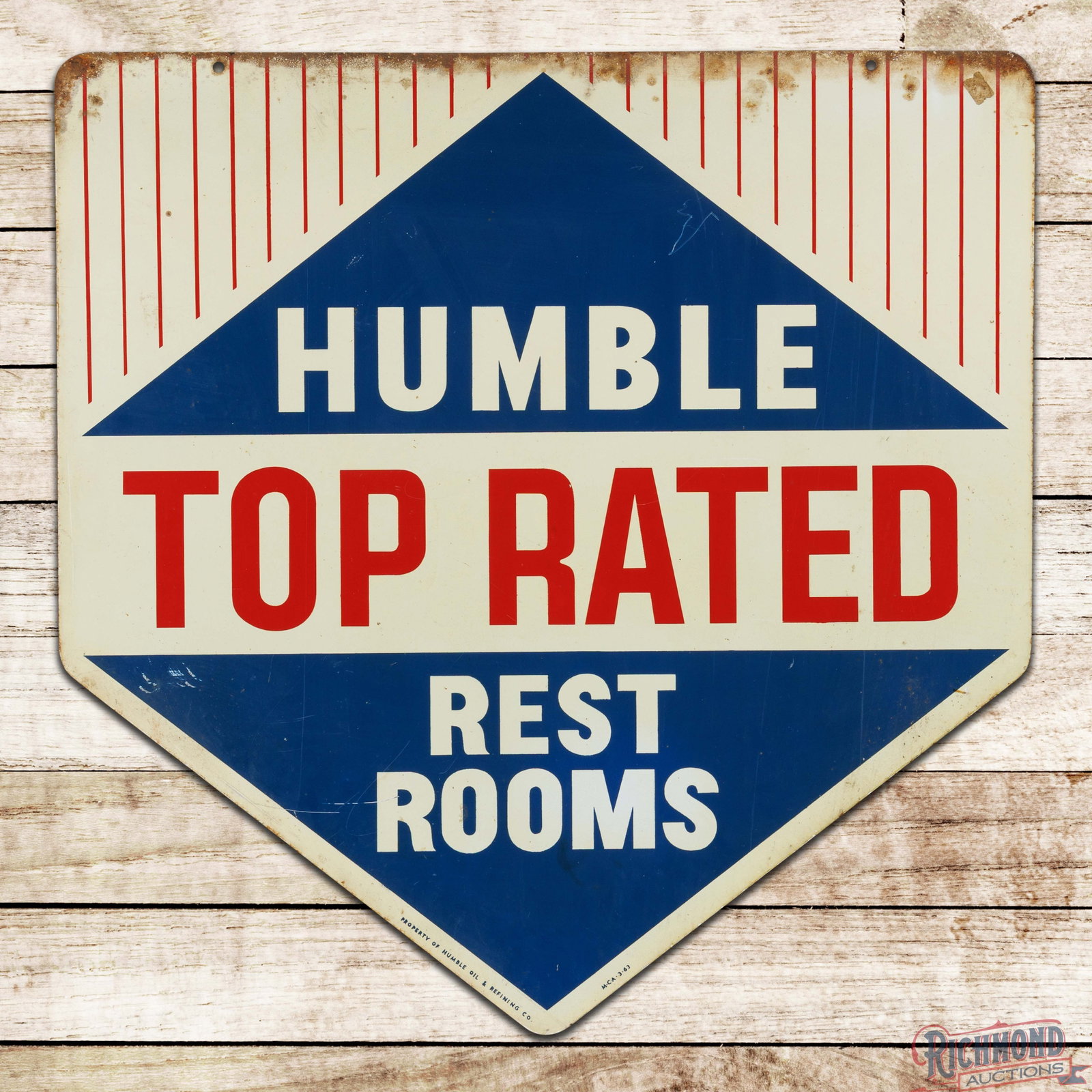 1963 Humble Oils Top Rated Rest Rooms Service Station 30" Double Sided Tin Sign: DST (double sided tin) sign has good color and shine. The display has fine scratches with areas of oxidation, discoloration and scuffs along the perimeter. The reverse has additional wear throughout. 
