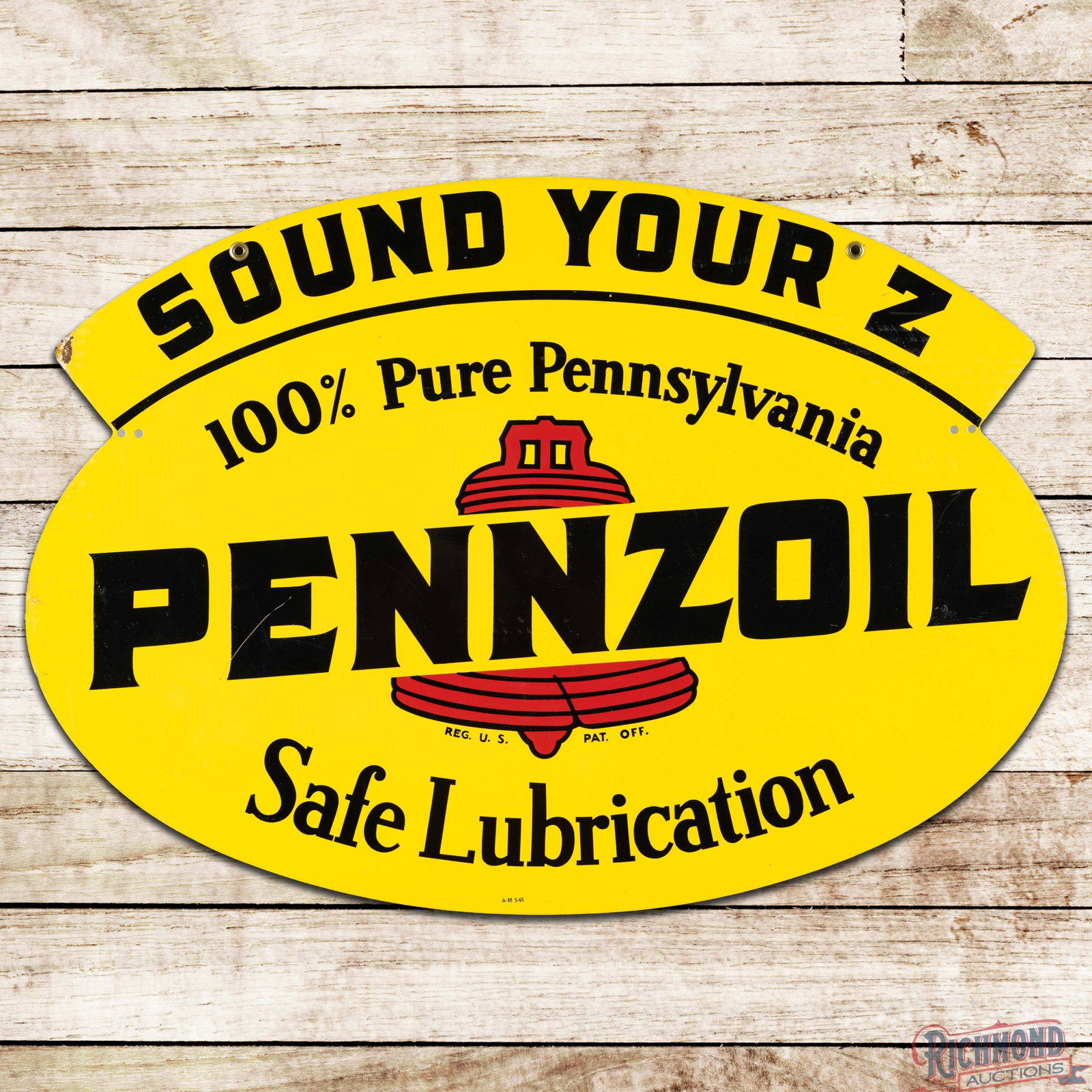 1965 Pennzoil "Sound Your Z" Safe Lubrication Double Sided Tin Sign: DST (double sided tin) sign has excellent color and shine. The display has light surface wear with paper marks in the fields. The perimeter has fine scratches, attached paper and minor oxidation. The 
