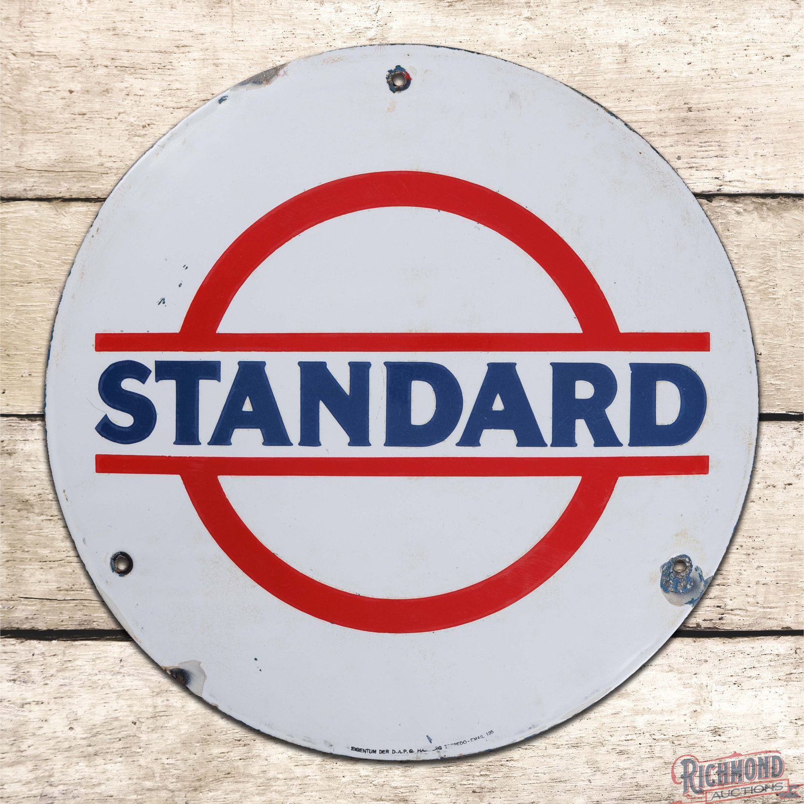 Standard Motor Oils 15.5" Convex Single Sided Porcelain Logo Sign: SSP (single sided porcelain) convex sign has good color and gloss. The display has slight cloudiness with surface wear and tiny chips in the outer fields. The perimeter has areas of discoloration with