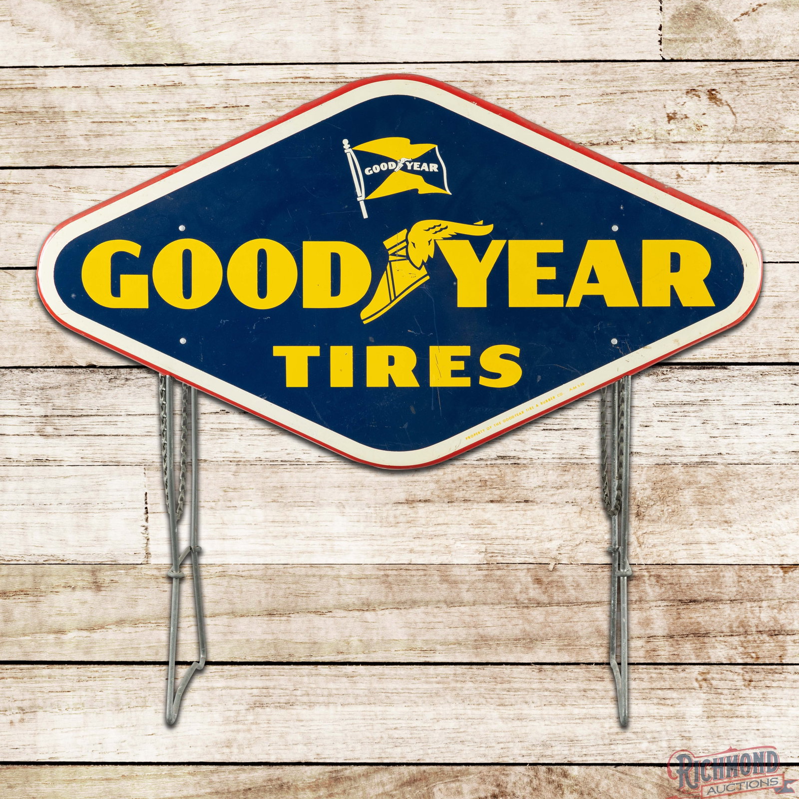 1958 Goodyear Tires CompleteTire Display w/ 2 Single Sided Tin Signs: DST (double sided tin) tire display has excellent color and shine. Side #1 has light wear with small scuffs in the fields. The perimeter has small paint chips along the outer edges. The reverse has ad