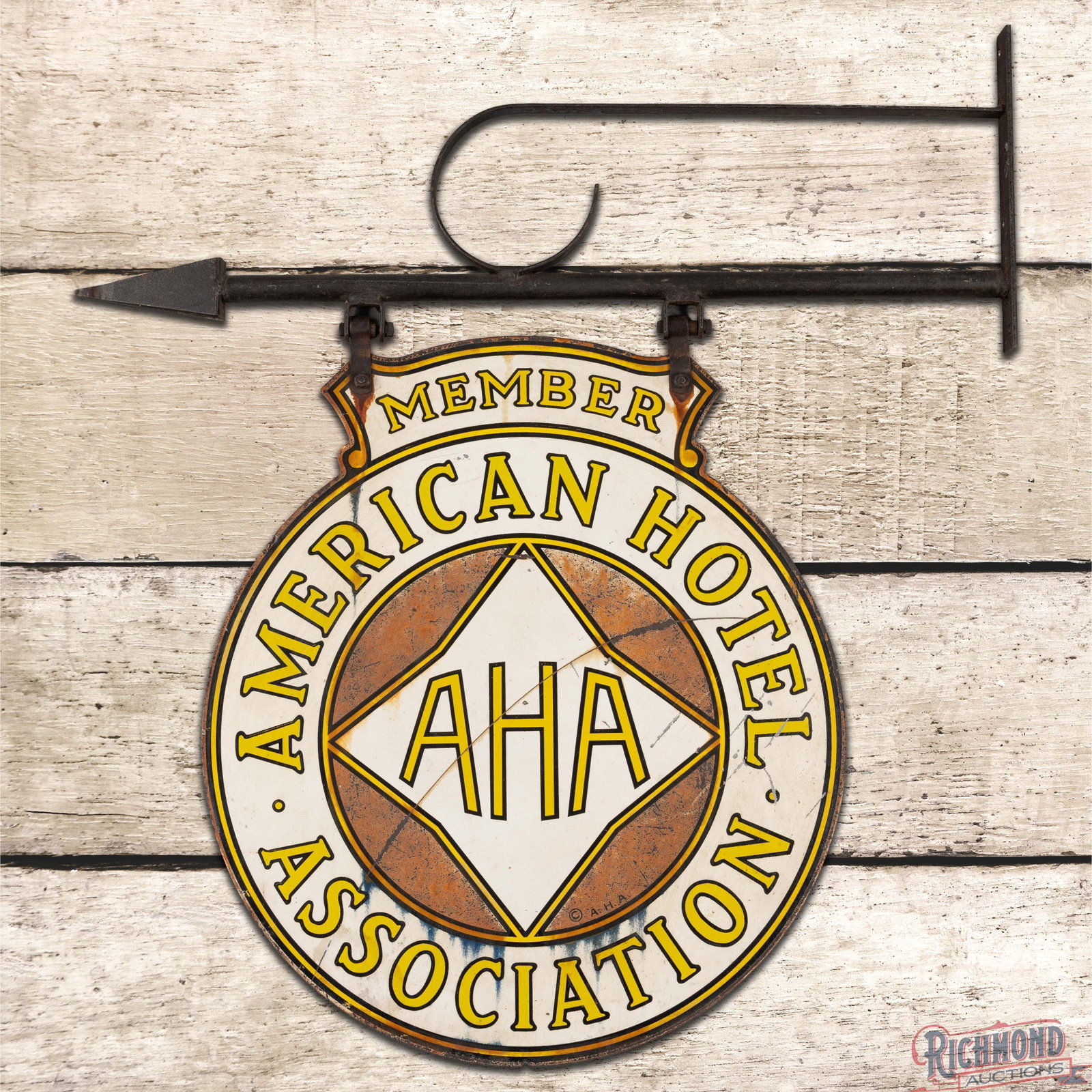 American Hotel Association Member AHA Double Sided Tin Sign w/ Factory Bracket: DST (double sided tin) sign has moderate color and shine. The display has general wear with fading and discoloration. The reverse has additional wear. The metal bracket is in very good condition. The 